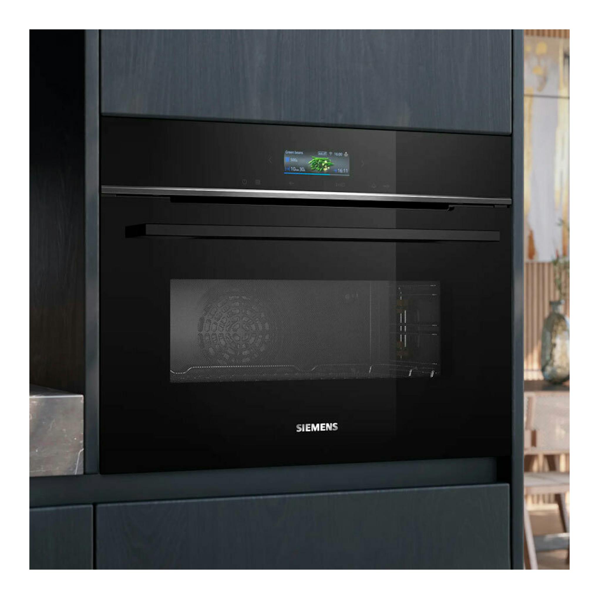 Horno empotrado Siemens CM724G1B1 negro, vista frontal, con puerta de cristal y pantalla superior.