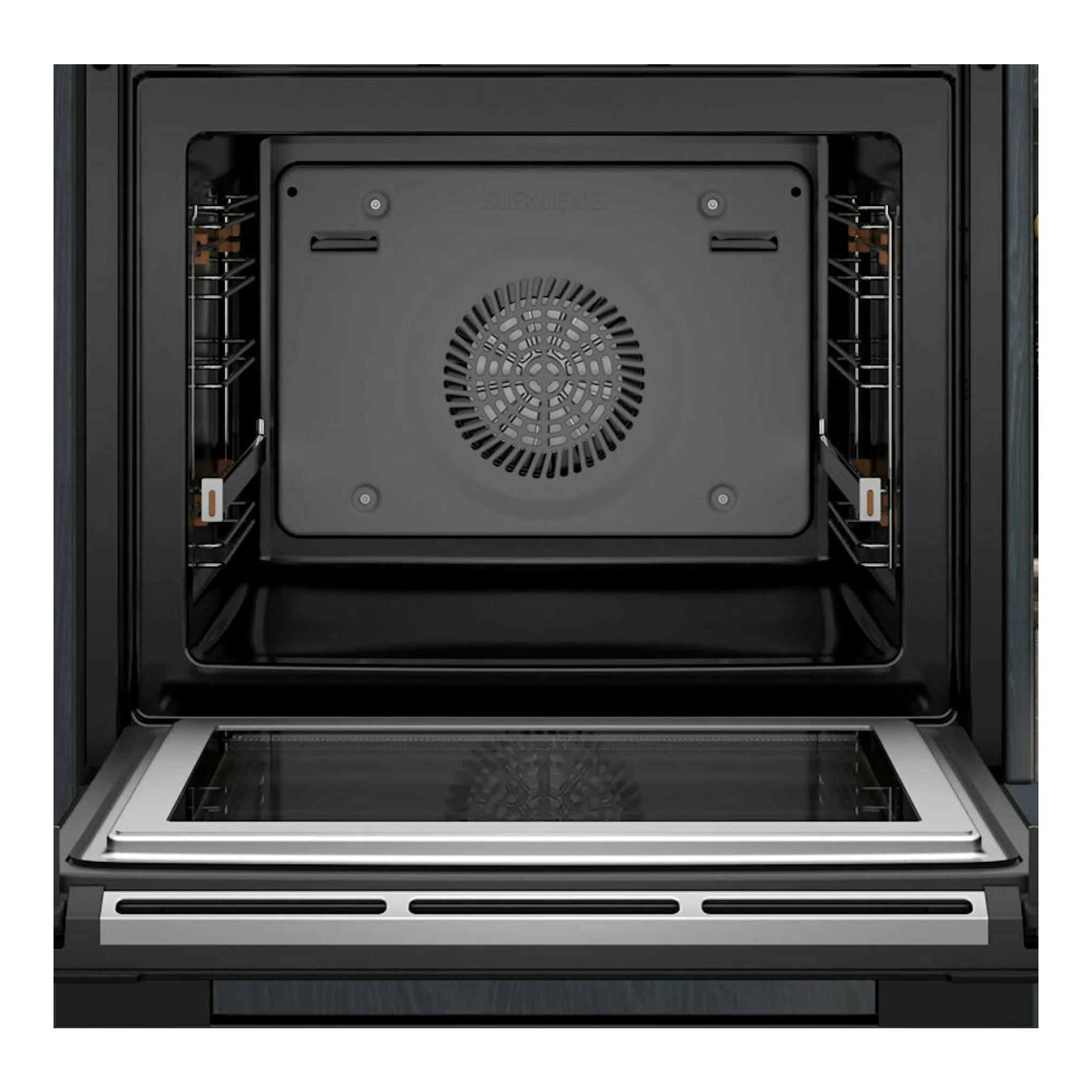Horno Siemens HM736GAB1 negro, vista frontal del interior con puerta abatida y cavidad negra.