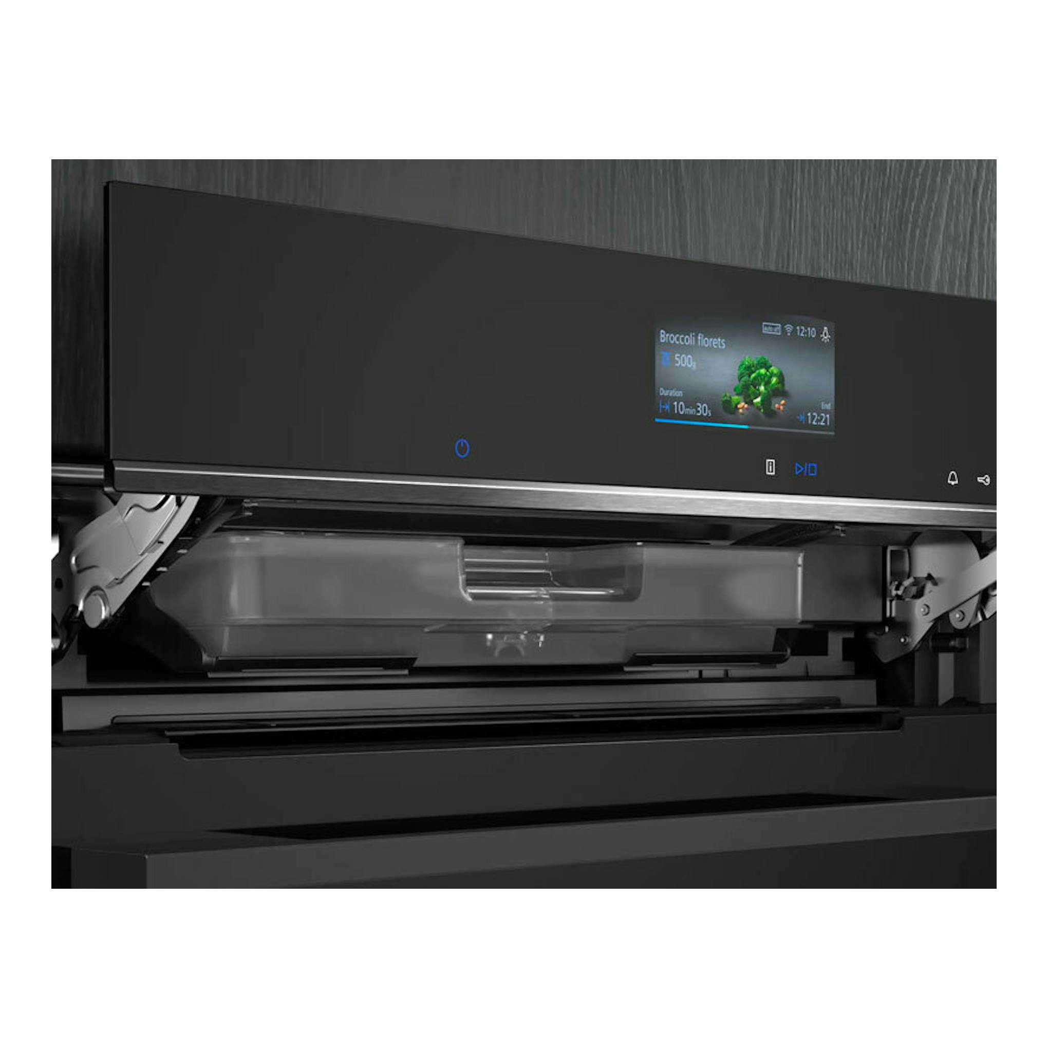 Producto Siemens HR736G1B1: horno empotrable negro abierto, con panel táctil y pantalla digital.
