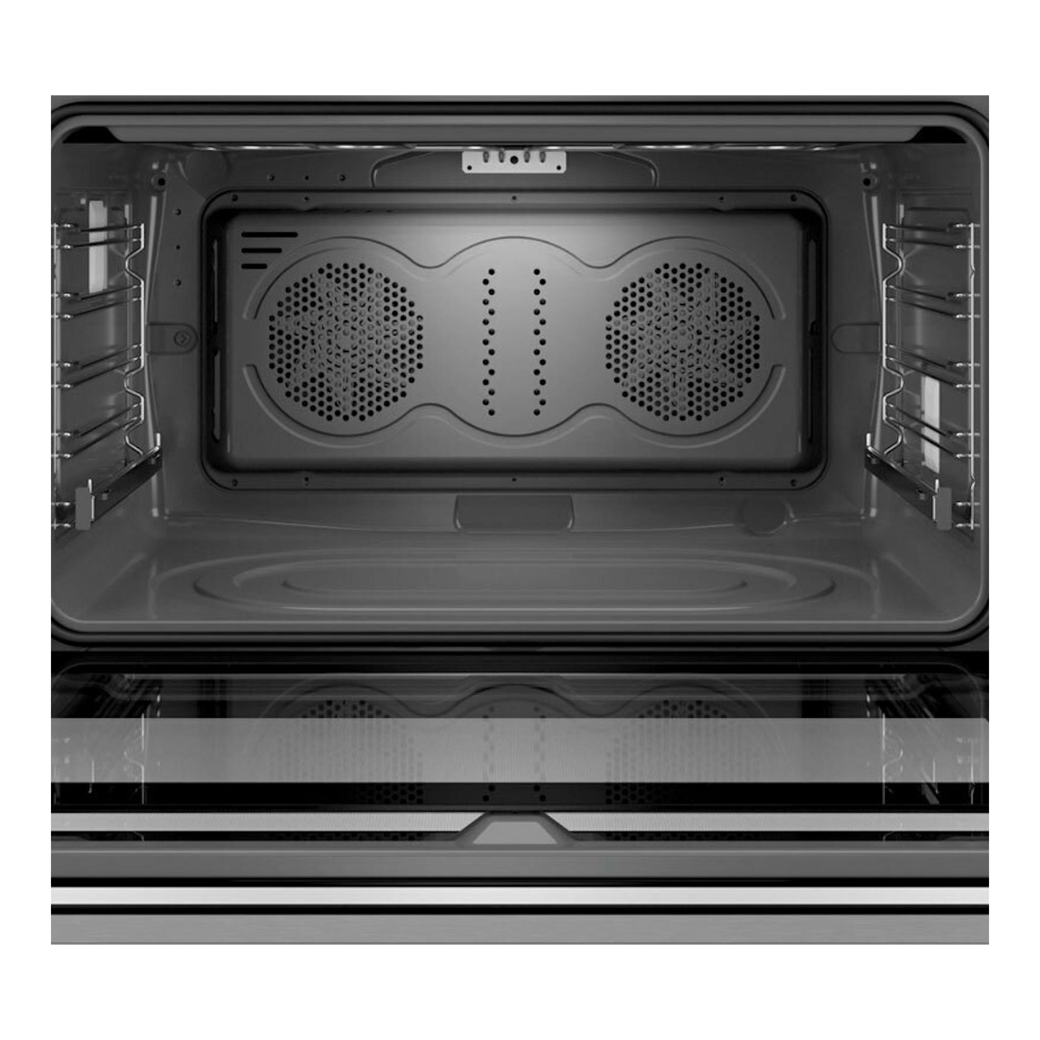 Interior de horno Siemens VB578D0S0 en vista frontal, con cavidad negra y paneles perforados.