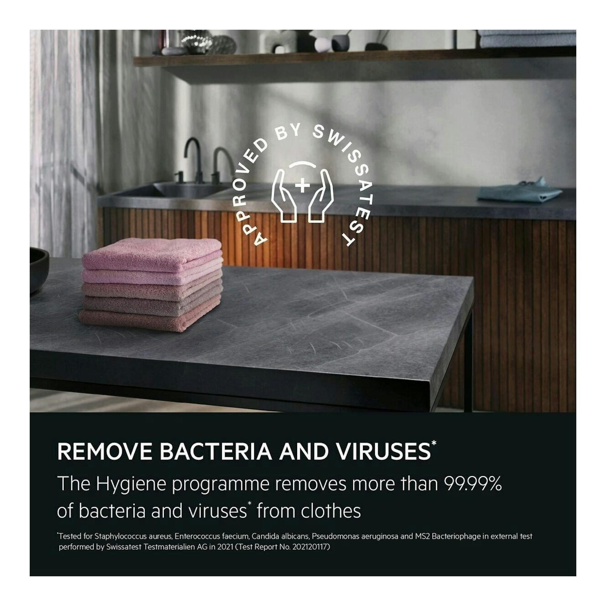 AEG LFE6G54H2B: imagen promocional de lavadora en lavadero moderno con toallas apiladas y texto informativo.