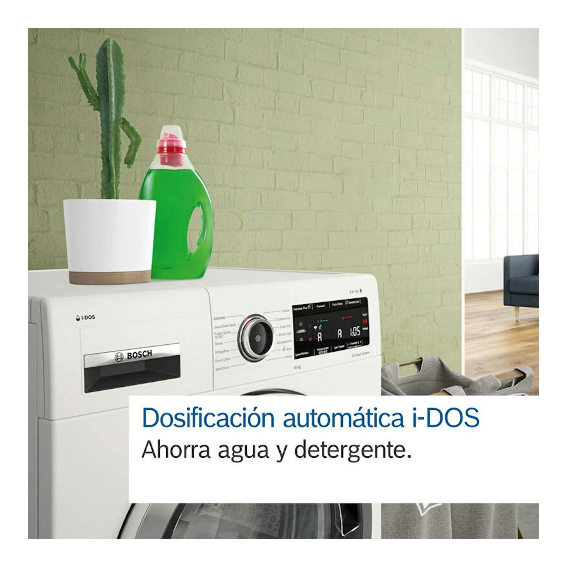 Lavadora Bosch WGB25400ES blanca, vista frontal parcial, con panel i-DOS y detergente encima.