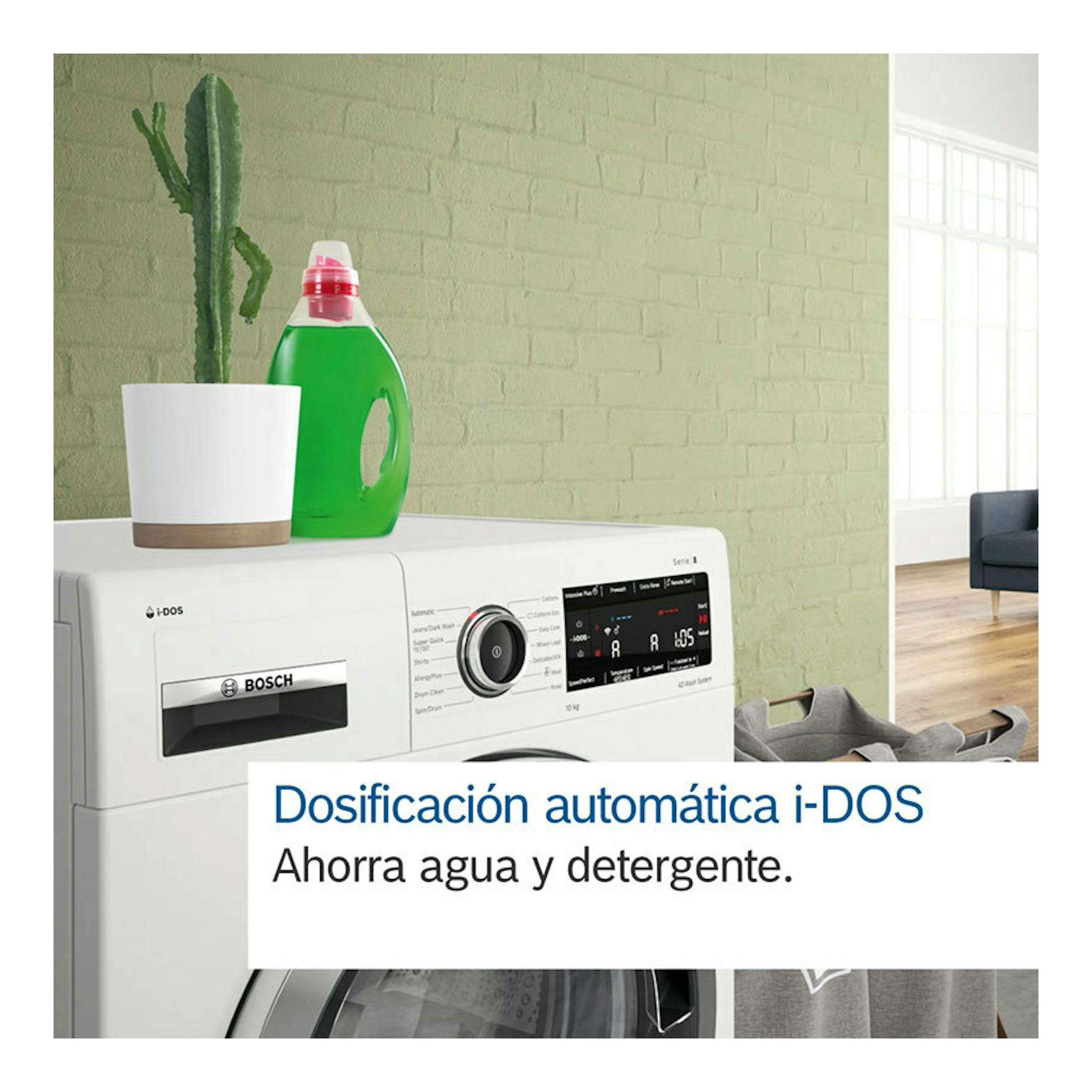Lavadora Bosch WGB25400ES blanca, vista frontal parcial, con panel i-DOS y detergente encima.