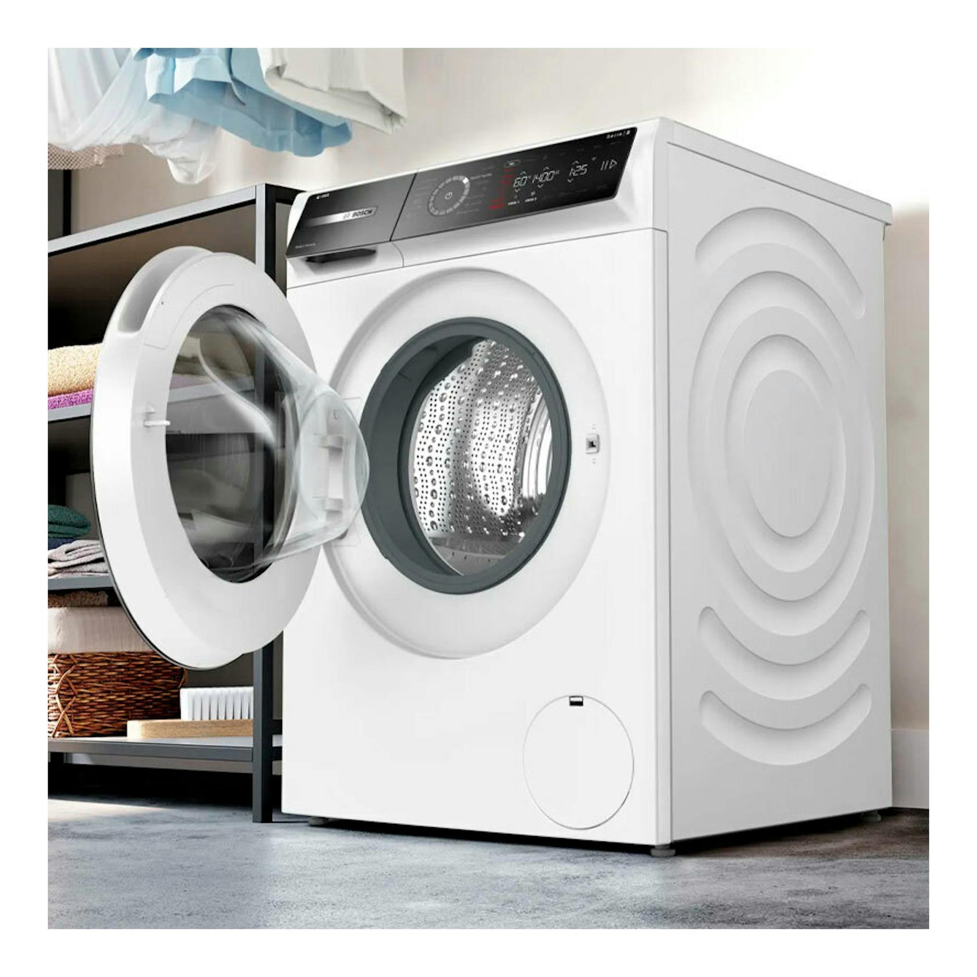 Lavadora Bosch WGB254A1ES blanca de 10 kg, vista frontal en ángulo, con la puerta abierta.
