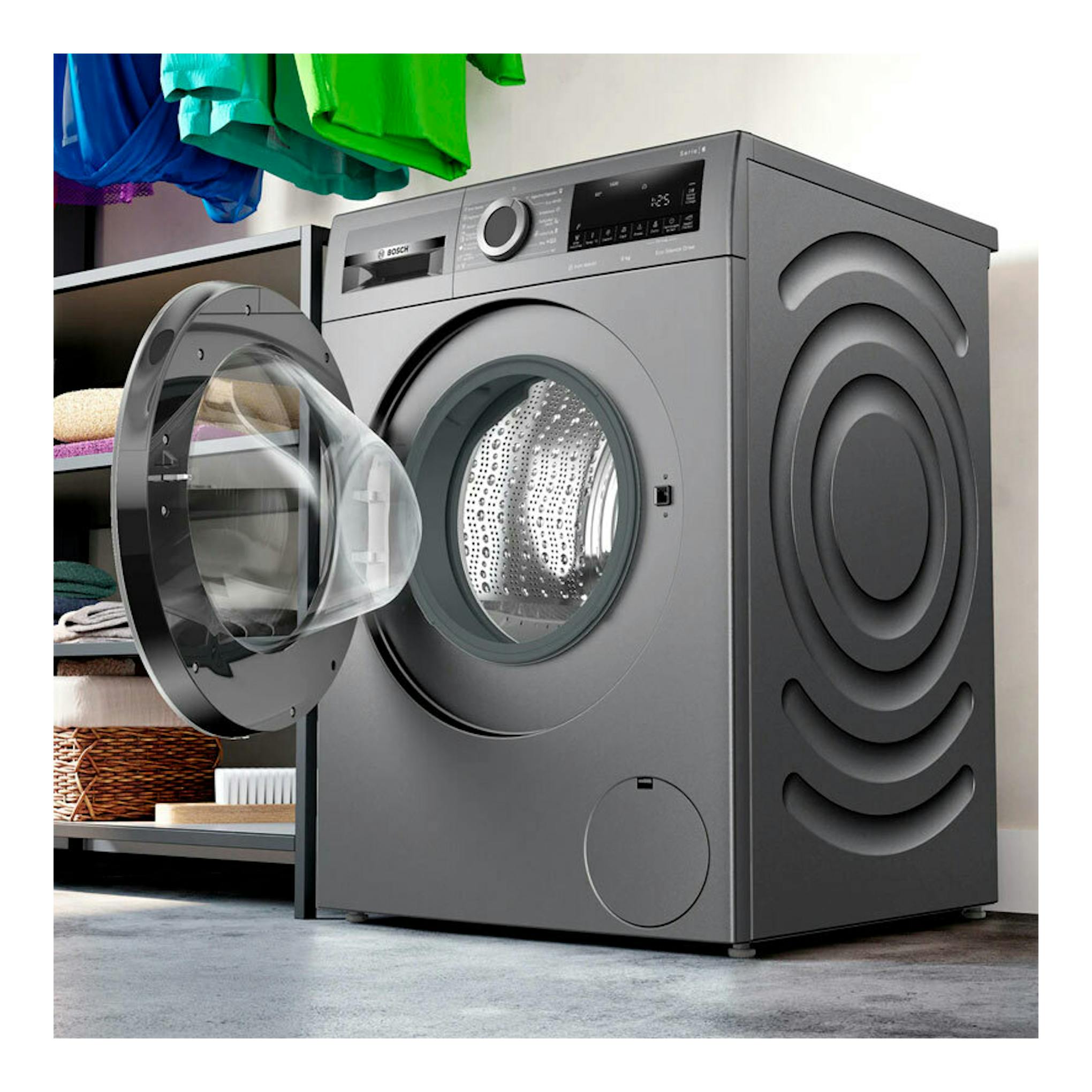 Lavadora Bosch WGG244ZRES 9 kg gris, vista frontal, con puerta abierta y tambor visible.