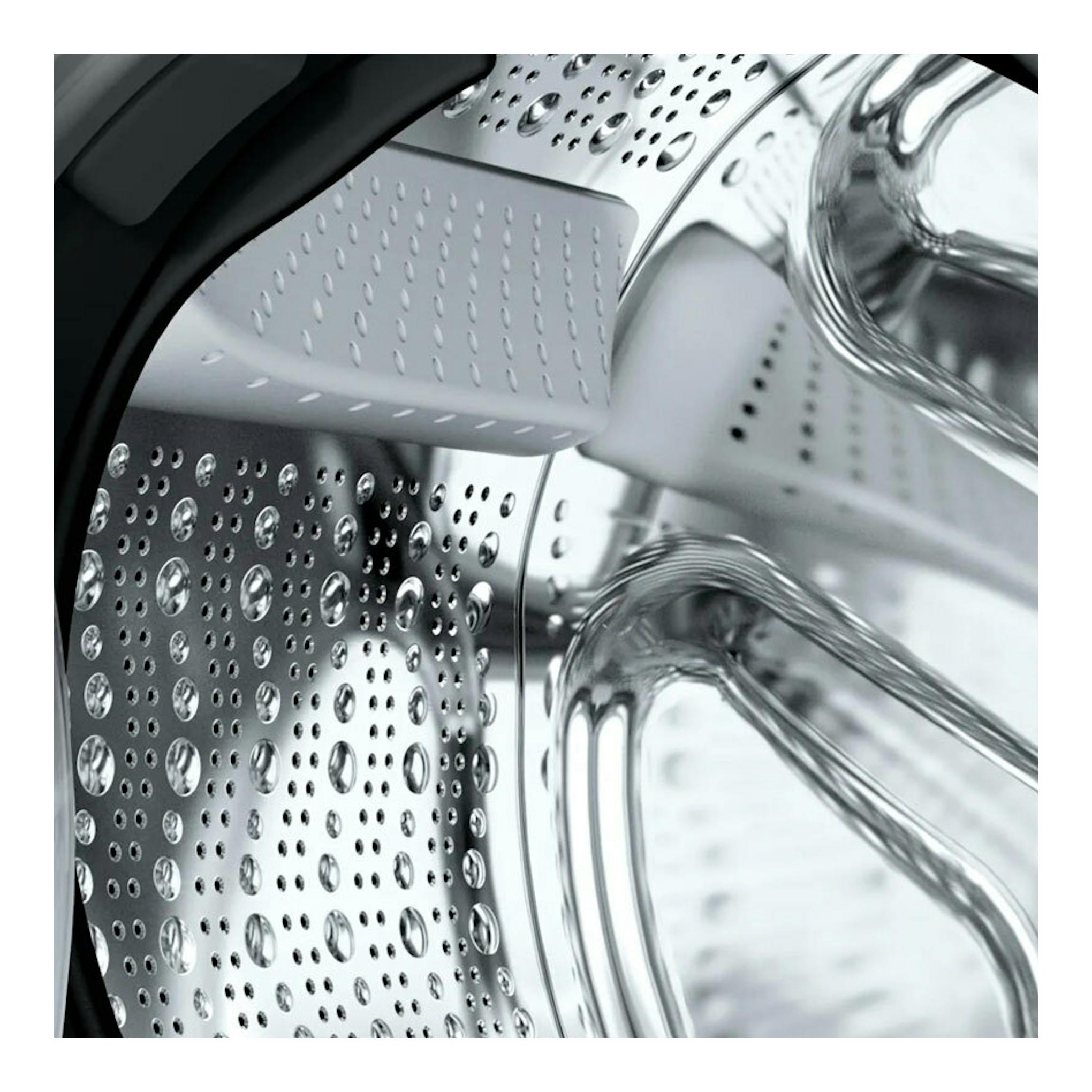 Bosch WGG254Z5ES, primer plano del tambor de lavadora de acero inoxidable.