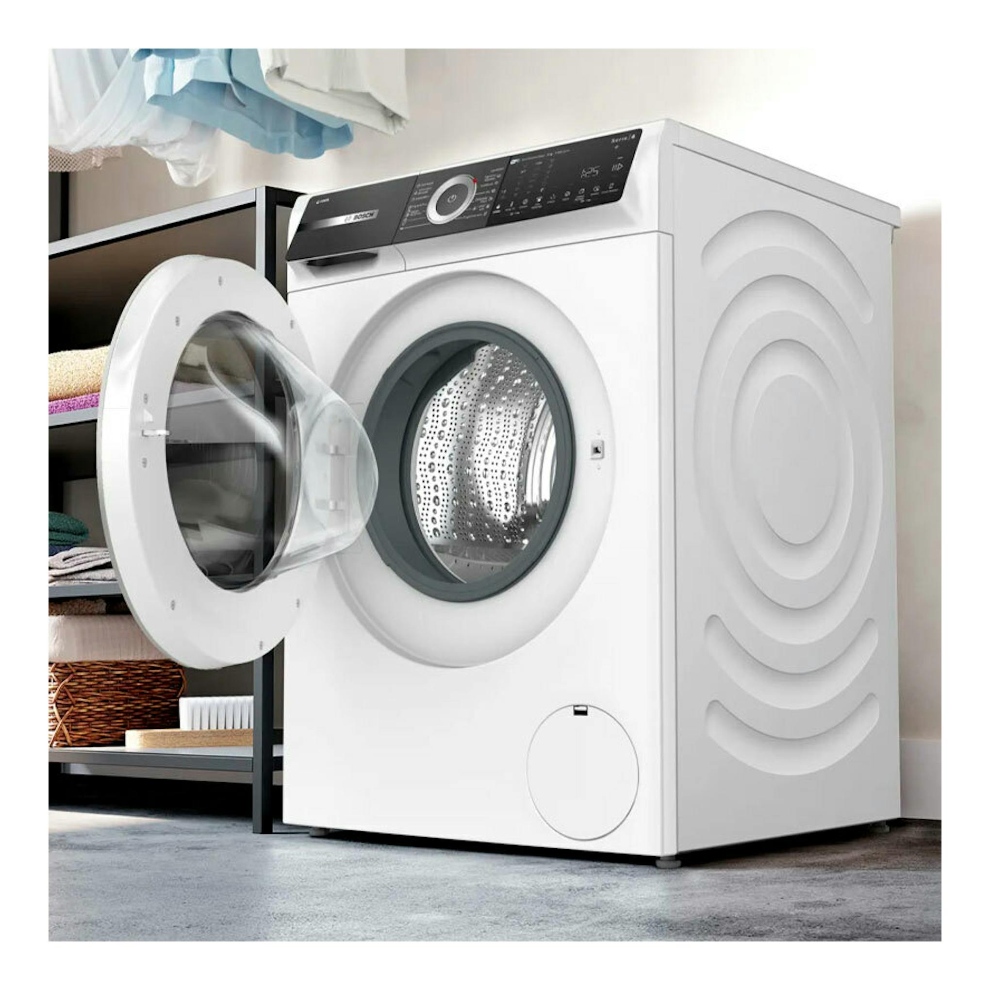 Lavadora Bosch WGH244A0ES blanca, de carga frontal, con puerta abierta y panel de control negro.