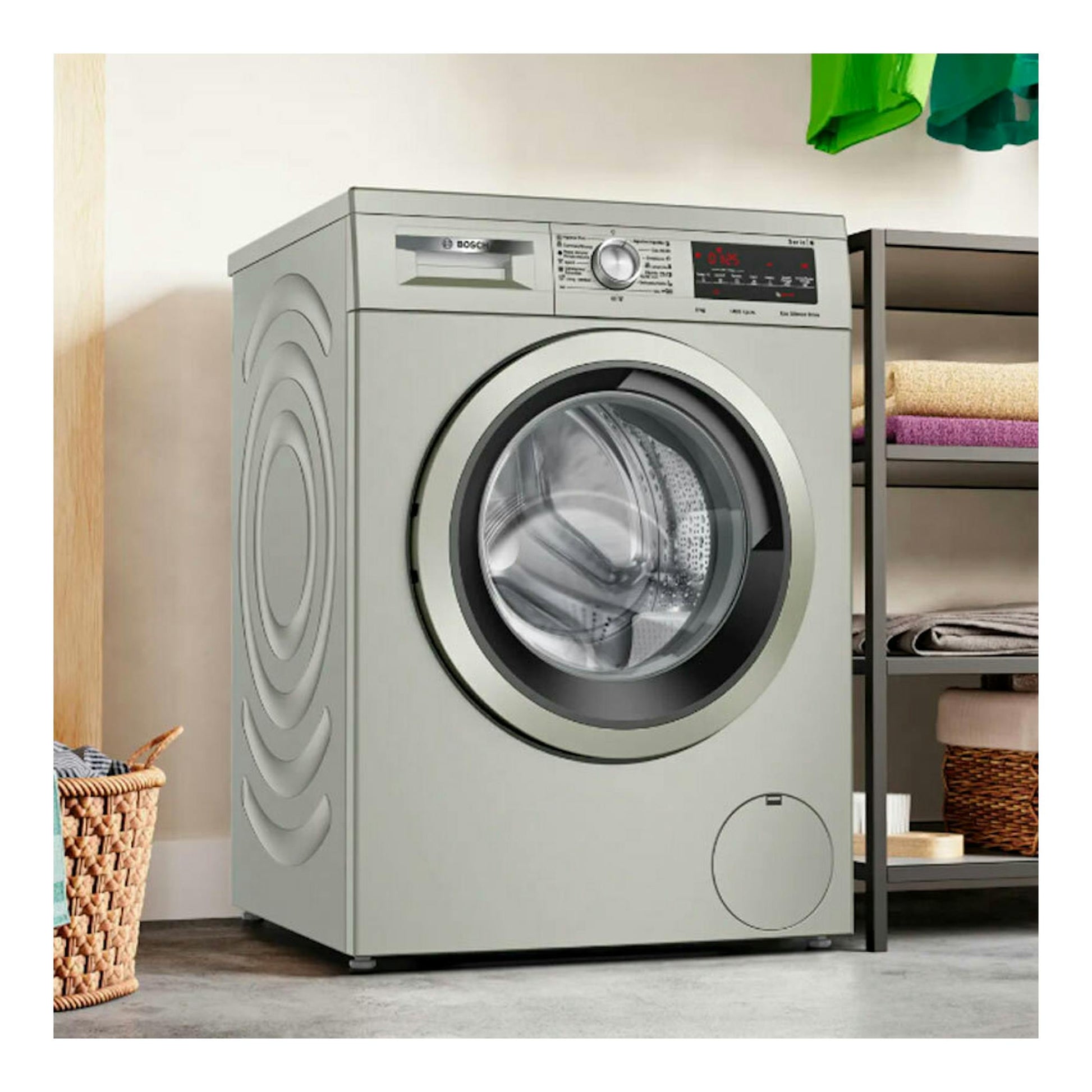 Lavadora Bosch WUU28T6KES gris, vista frontal, con puerta circular y panel digital.