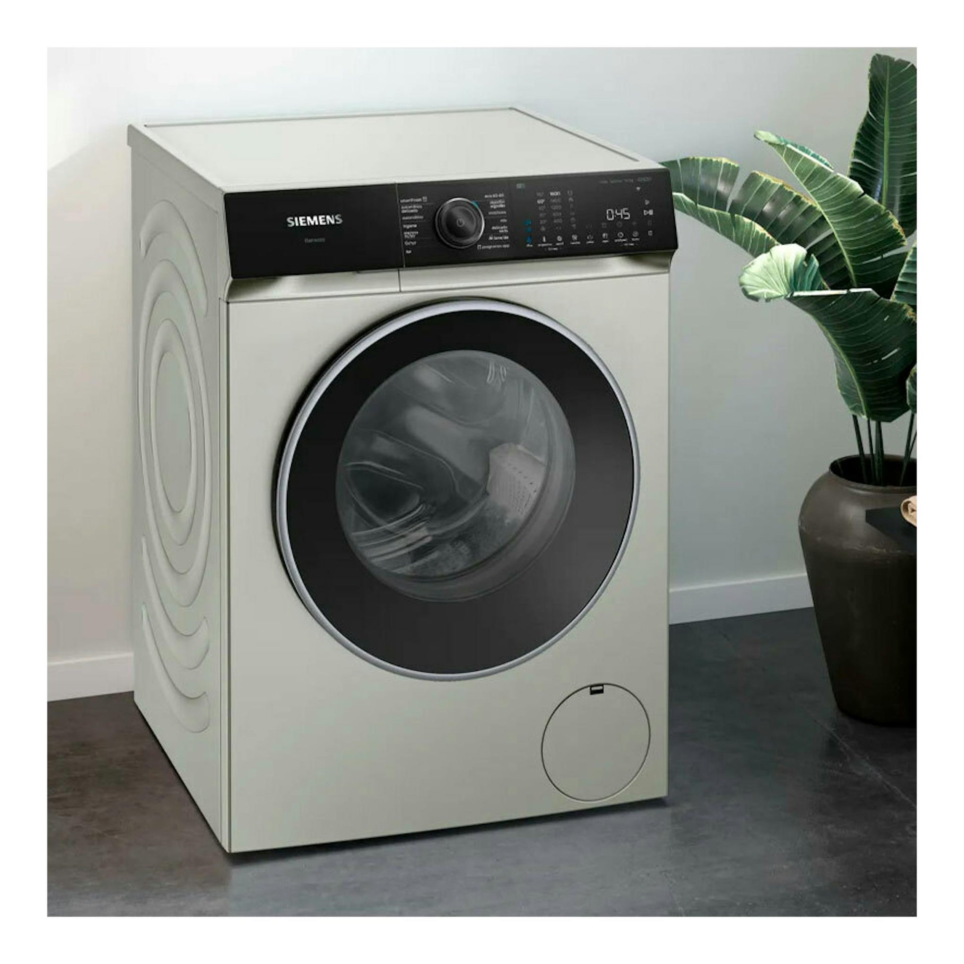 Lavadora frontal Siemens WG56H2AXES, gris claro, vista frontal, puerta circular negra y panel negro.