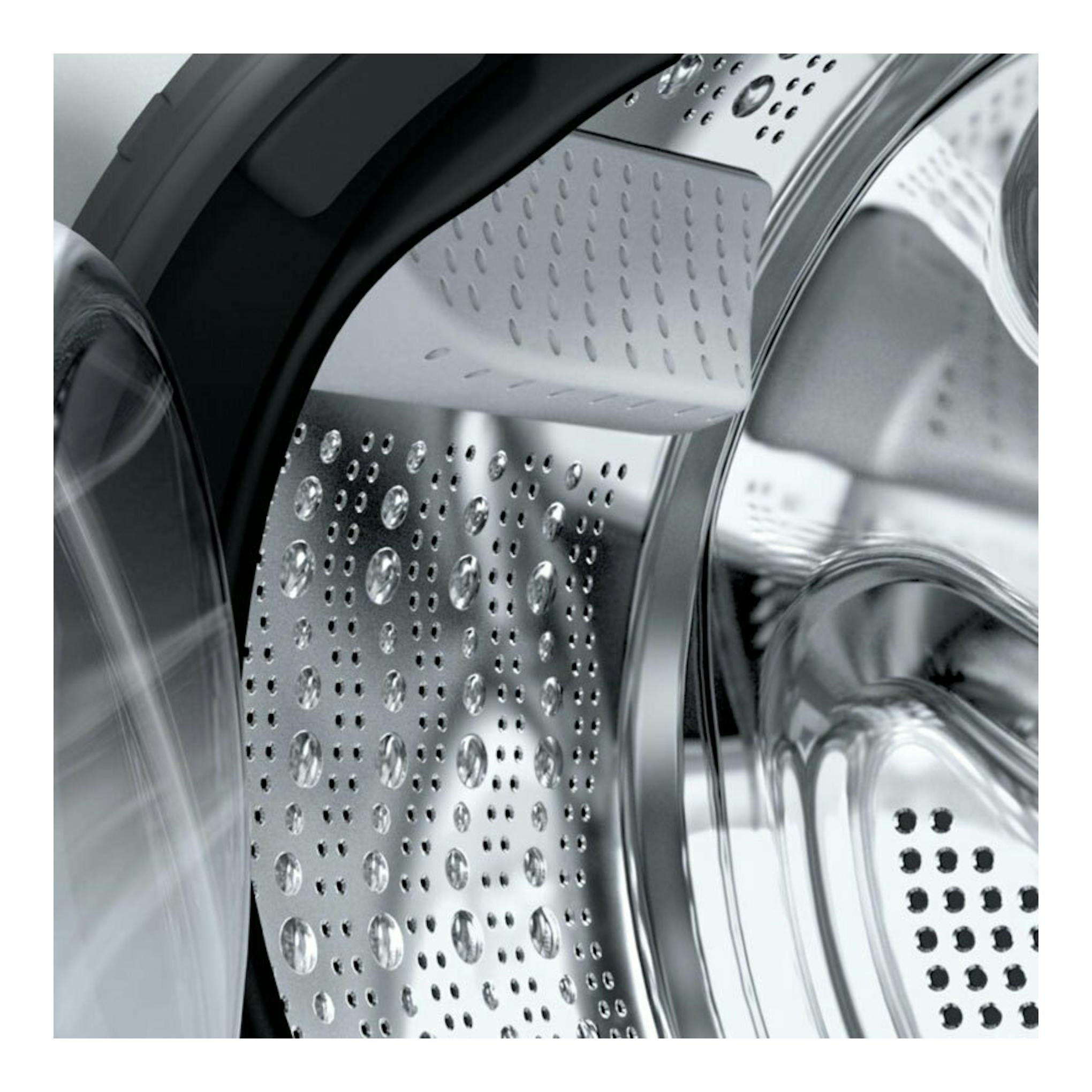 Lavadora Siemens WM12N265ES, vista interior del tambor de acero inoxidable en primer plano.