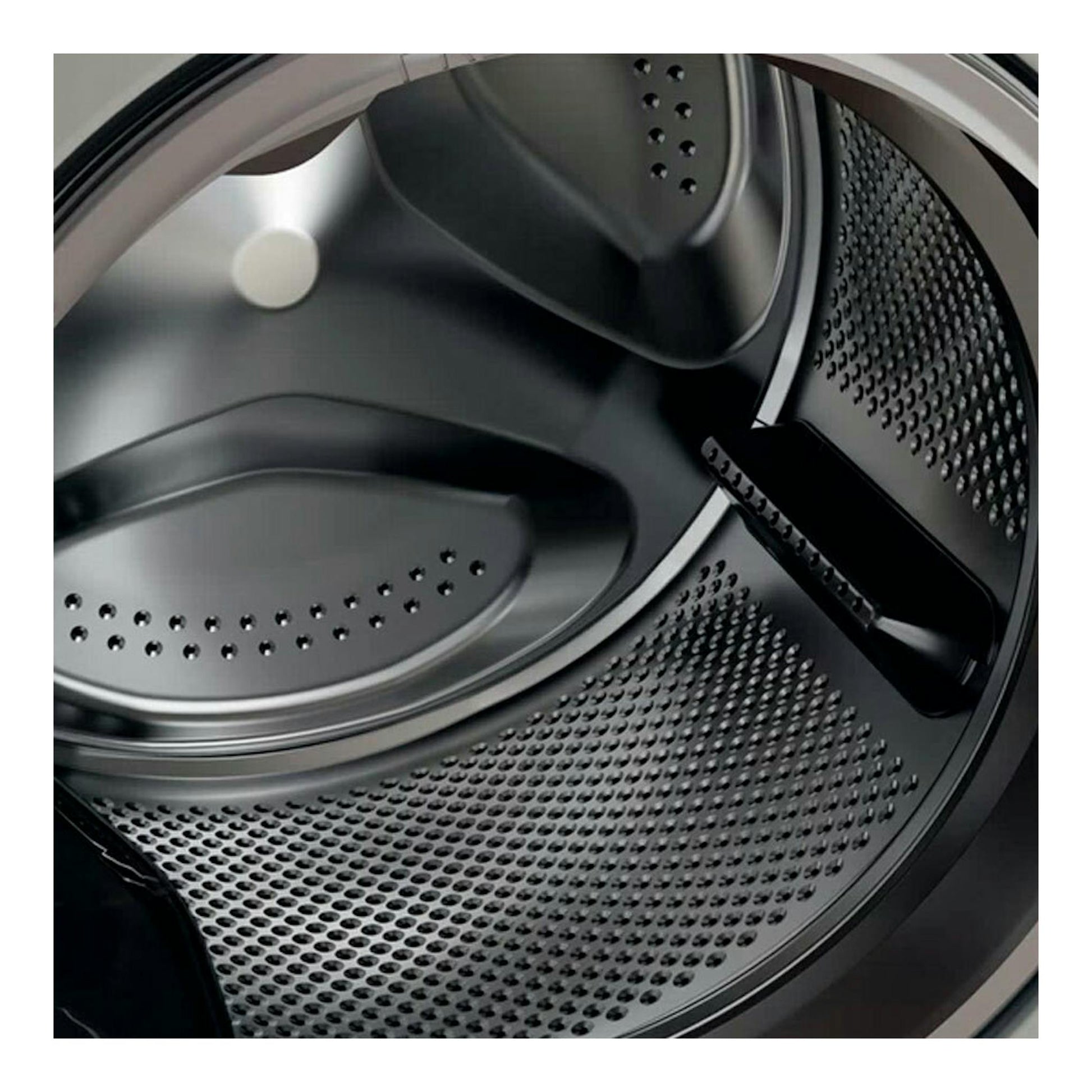 Lavadora Whirlpool FFB 9489 SBV SPT, vista interior del tambor metálico plateado de carga frontal.