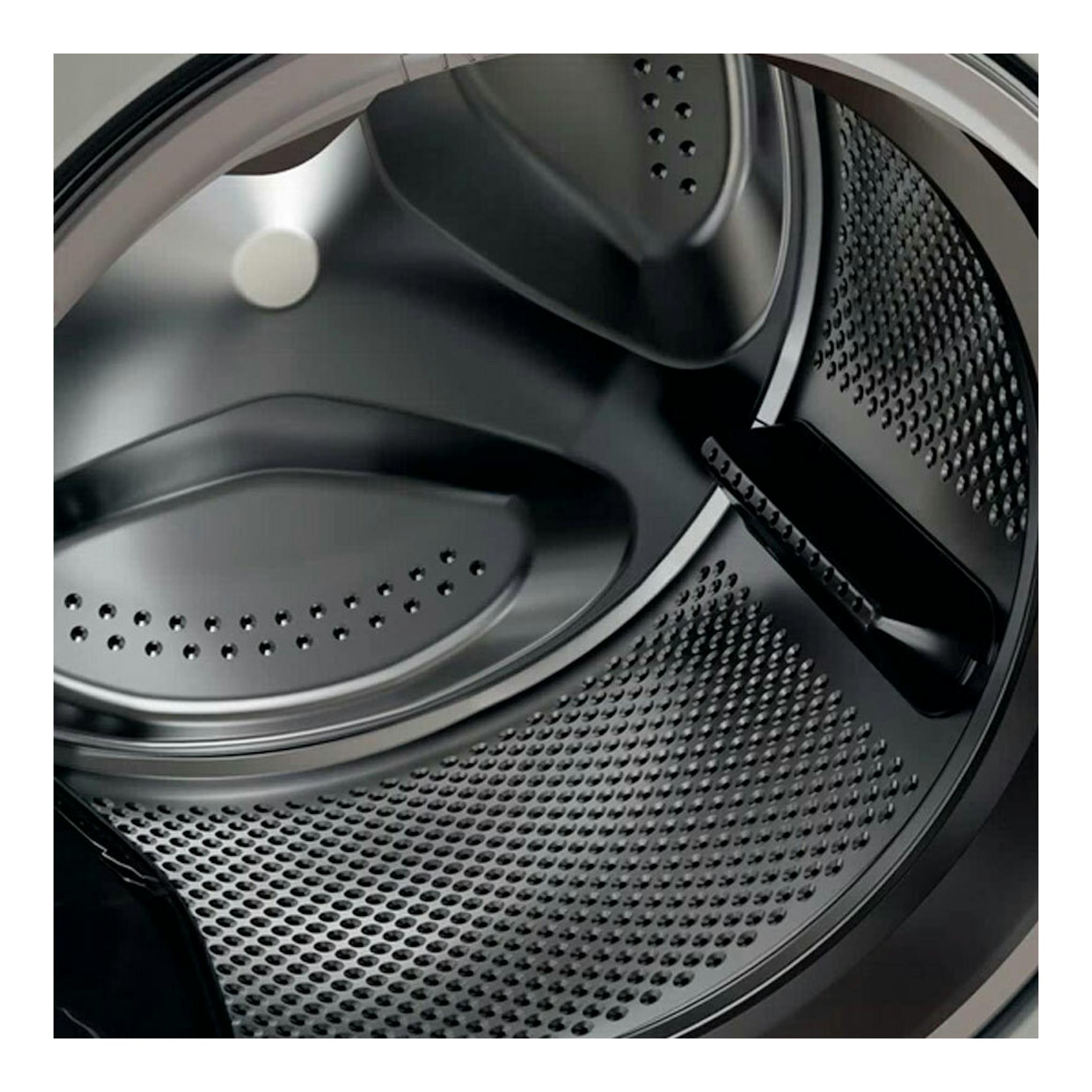 Lavadora Whirlpool FFB 9489 SBV SPT, vista interior del tambor metálico plateado de carga frontal.