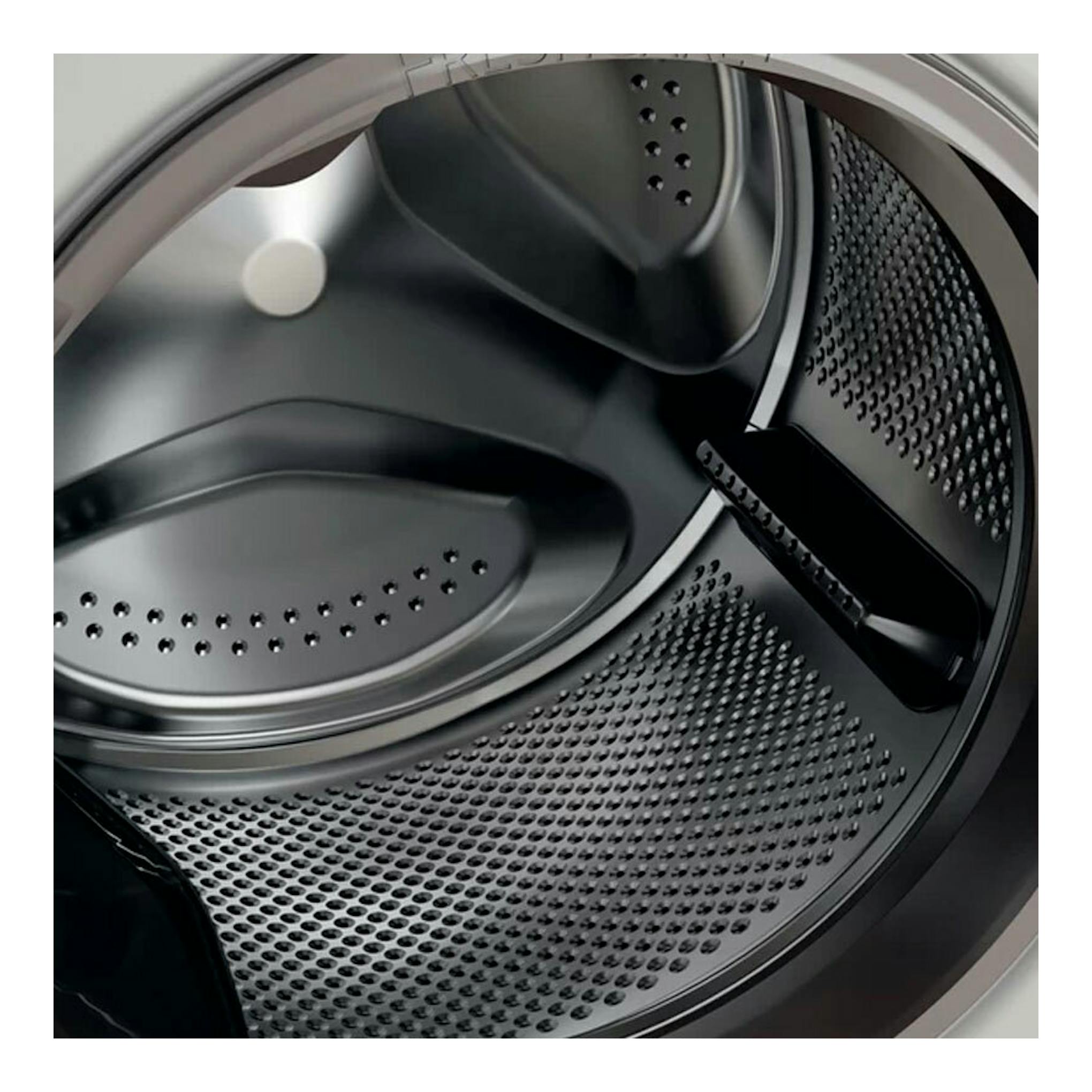 Interior del tambor de lavadora Whirlpool FFB8489BVSPT, vista en primer plano, acero inoxidable.