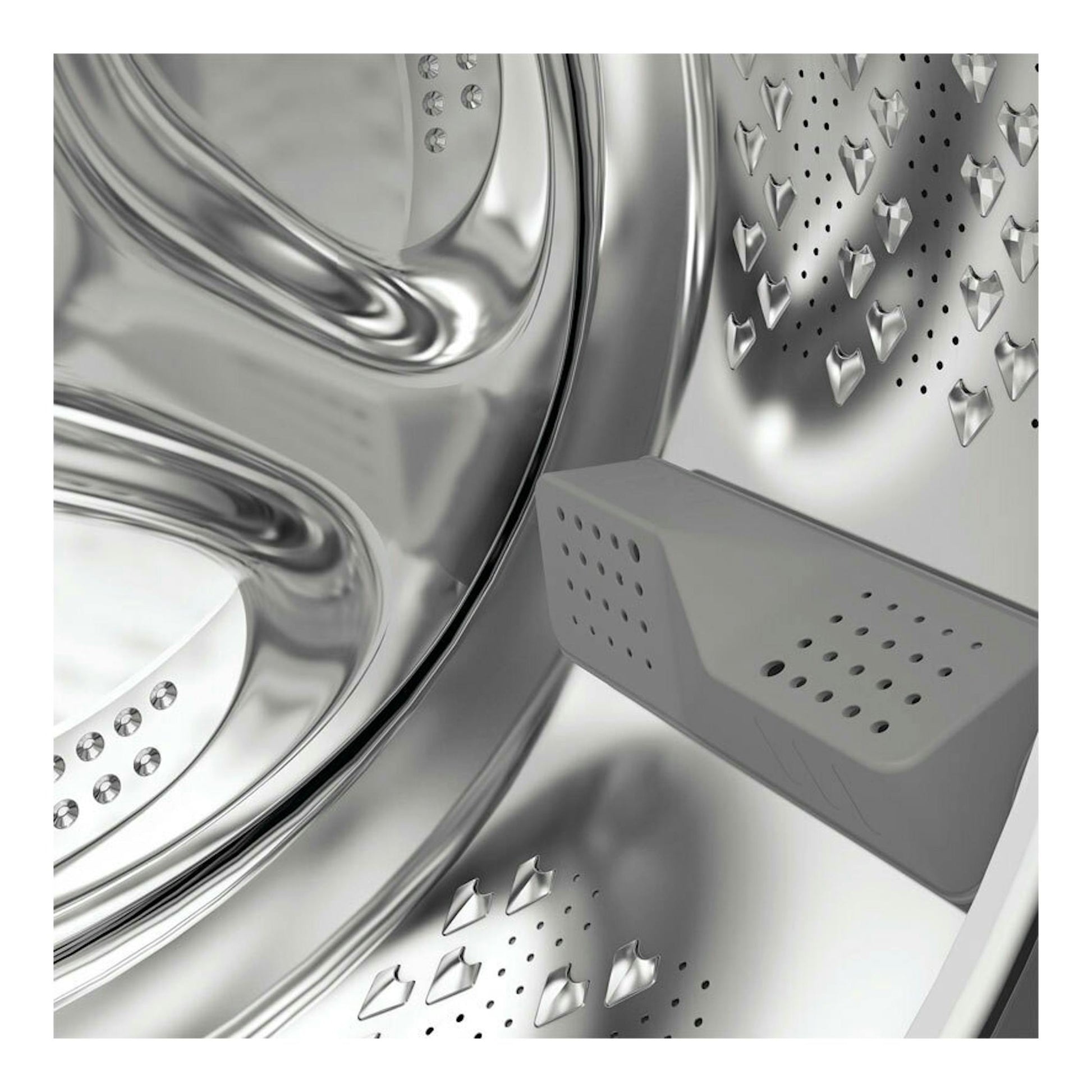 Interior de lavadora Whirlpool WPM97WADSSPT de acero inoxidable, vista en primer plano del tambor y aspas.