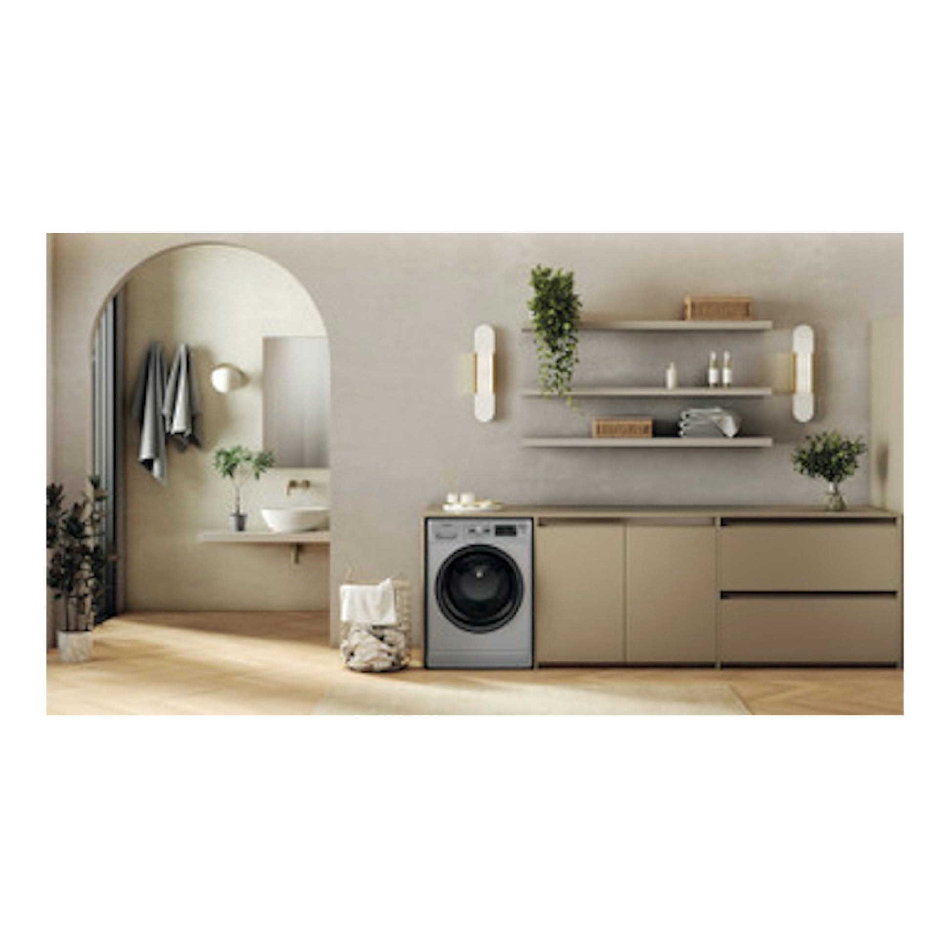 Lavasecadora Whirlpool FFWDB 964489 SBV SPT, frontal, color plata, en un lavadero moderno.