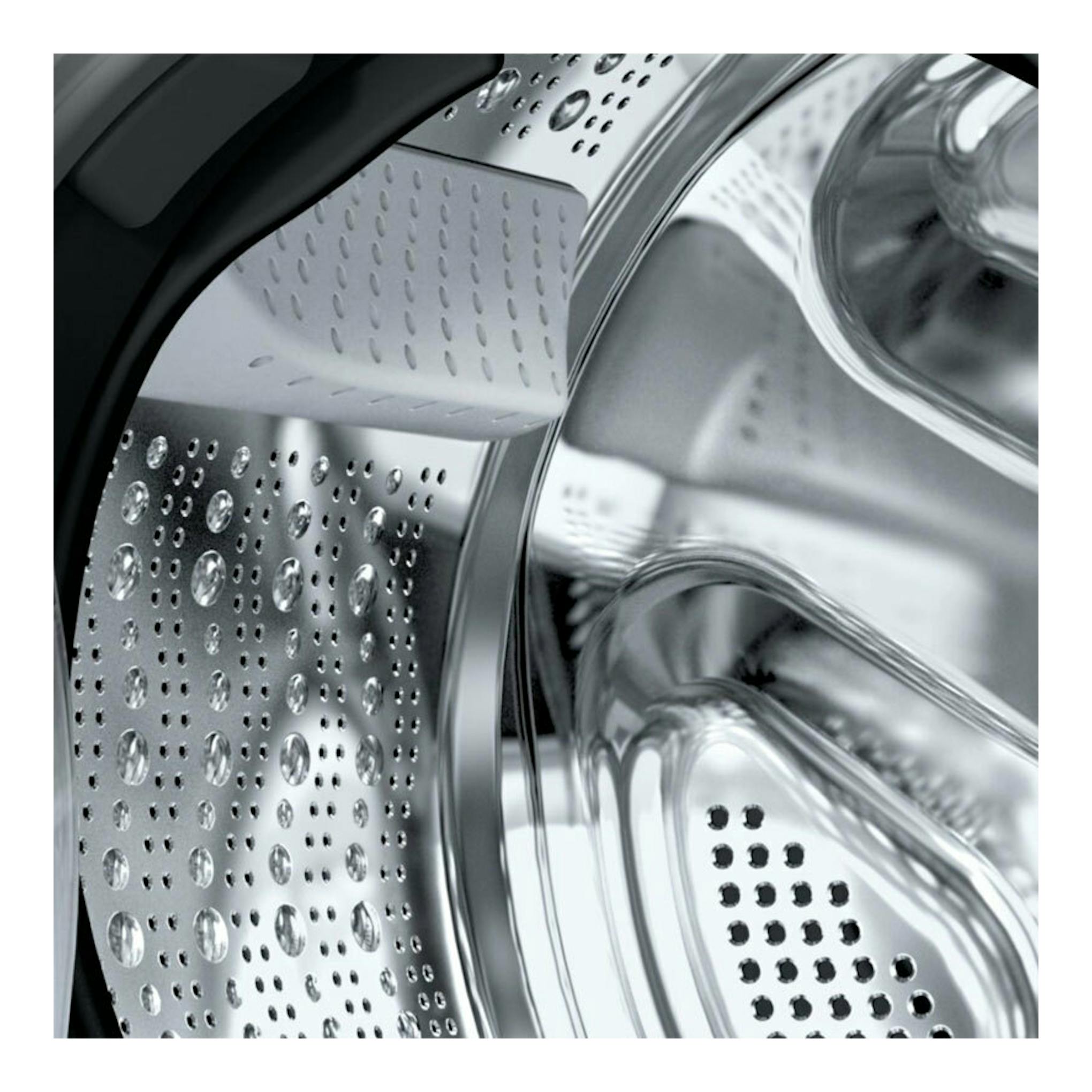 Interior del tambor de una lavasecadora Siemens WN54C2A0ES, vista en primer plano en acero inoxidable.