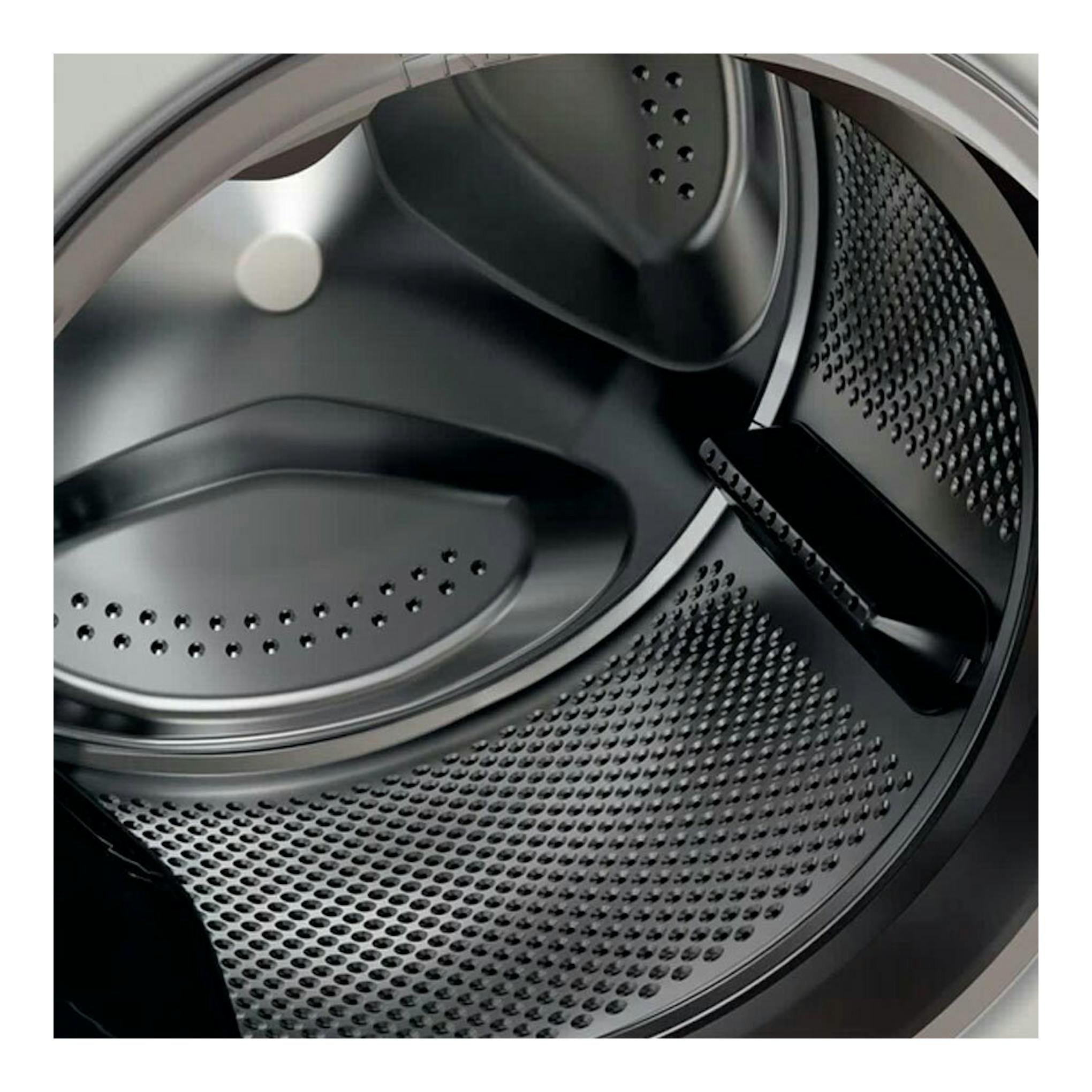 Whirlpool FWDD1074269BVSPT: tambor interior de lavasecadora de acero inoxidable, vista en primer plano.