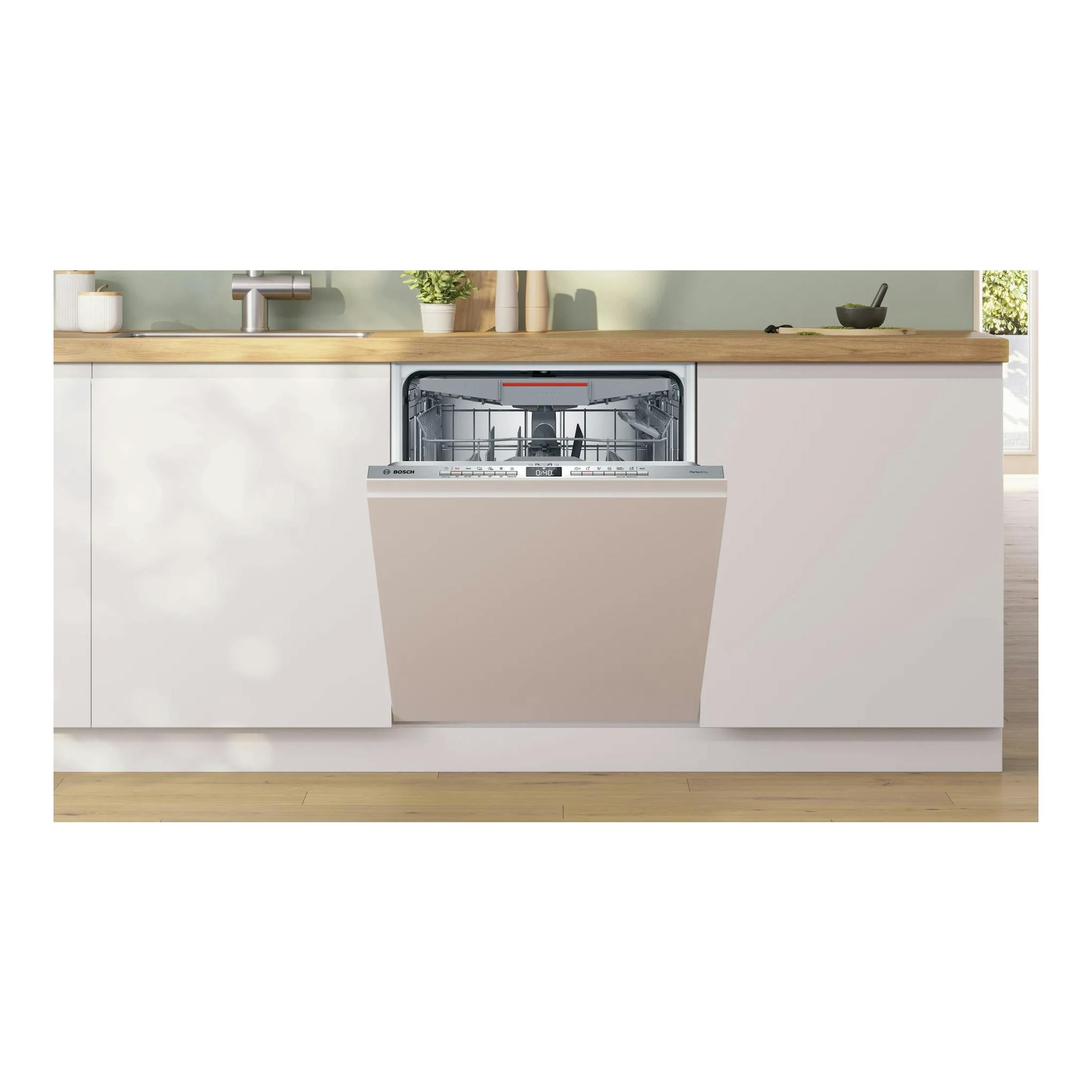 Lavavajillas Bosch SBV6YCX02E integrable, abierto bajo encimera de madera, con cesta interior visible.