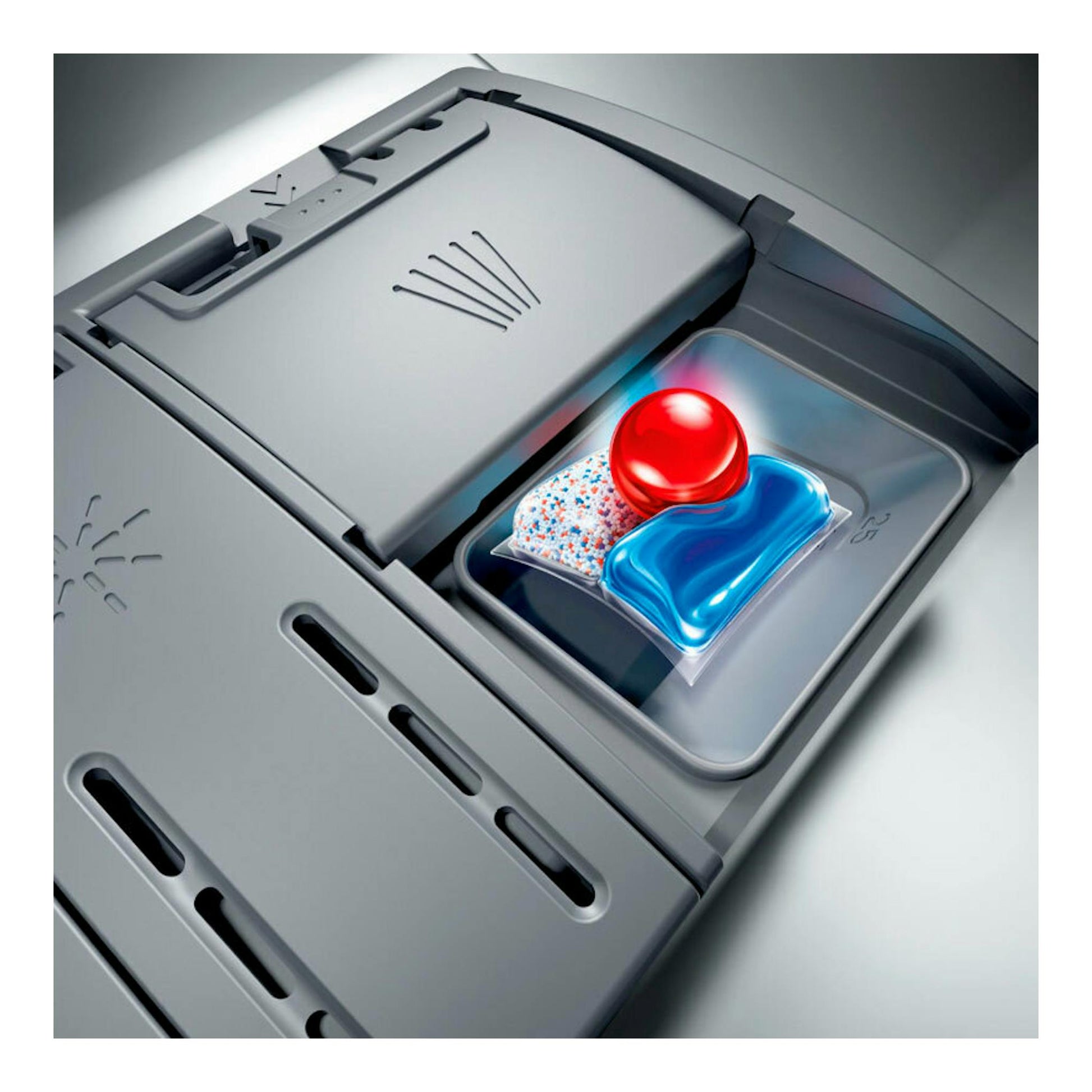 Bosch SMS2HMW04E, vista cenital del compartimento gris del lavavajillas con pastilla detergente azul y roja.