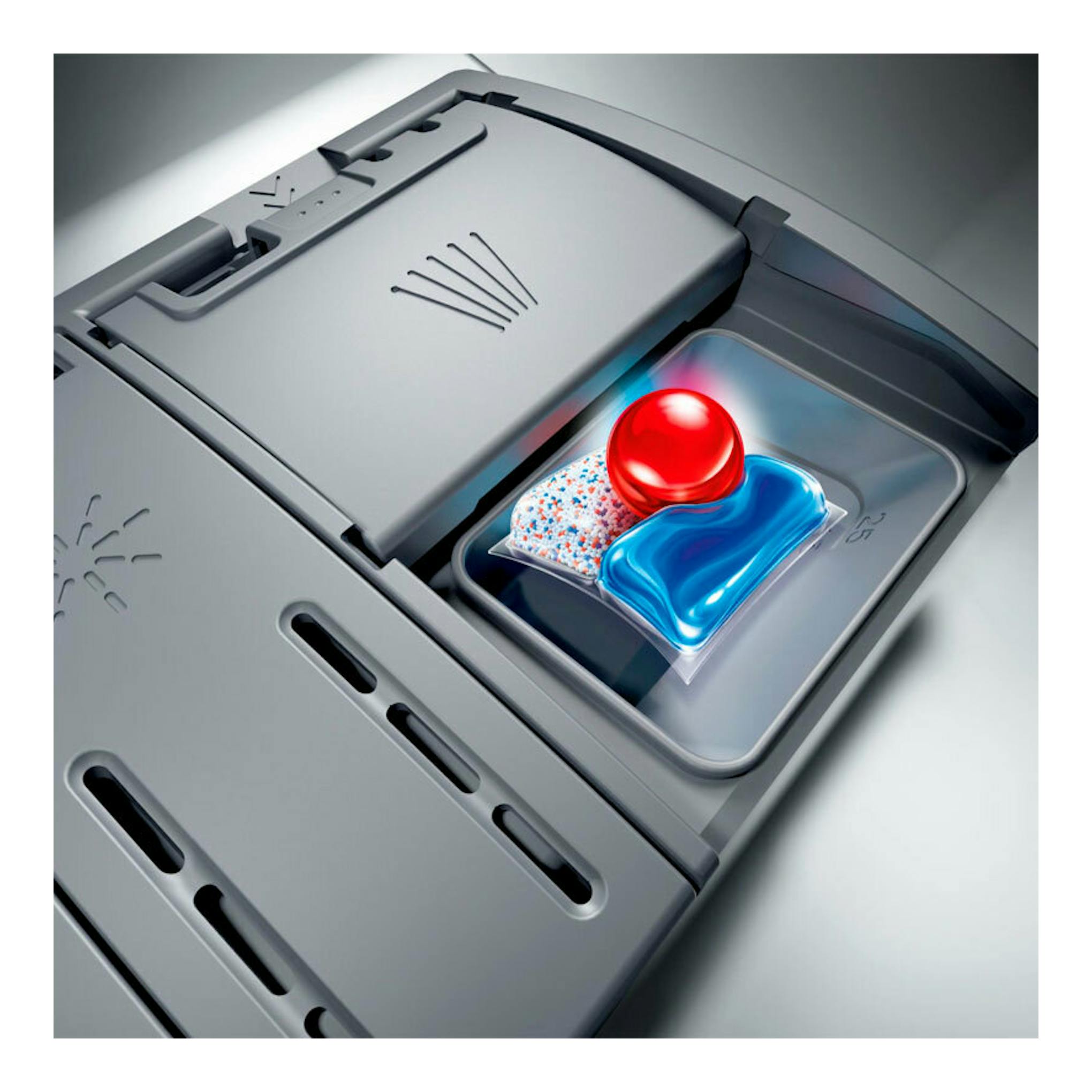 Lavavajillas Bosch SMS4EMC06E, vista cenital del cajetín gris con cápsula de detergente.