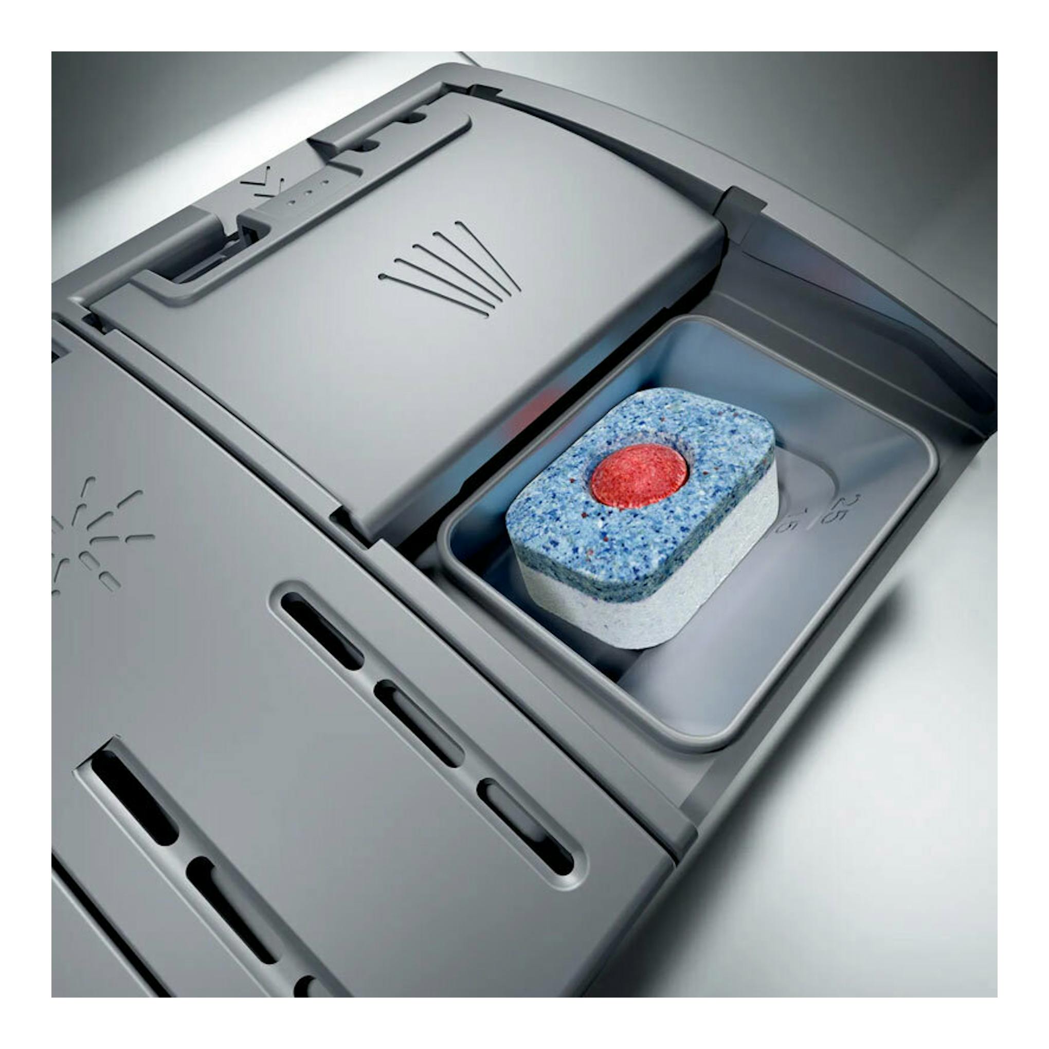 Bosch SMS4EMI06E, interior superior de lavavajillas gris con compartimento de detergente y pastilla.