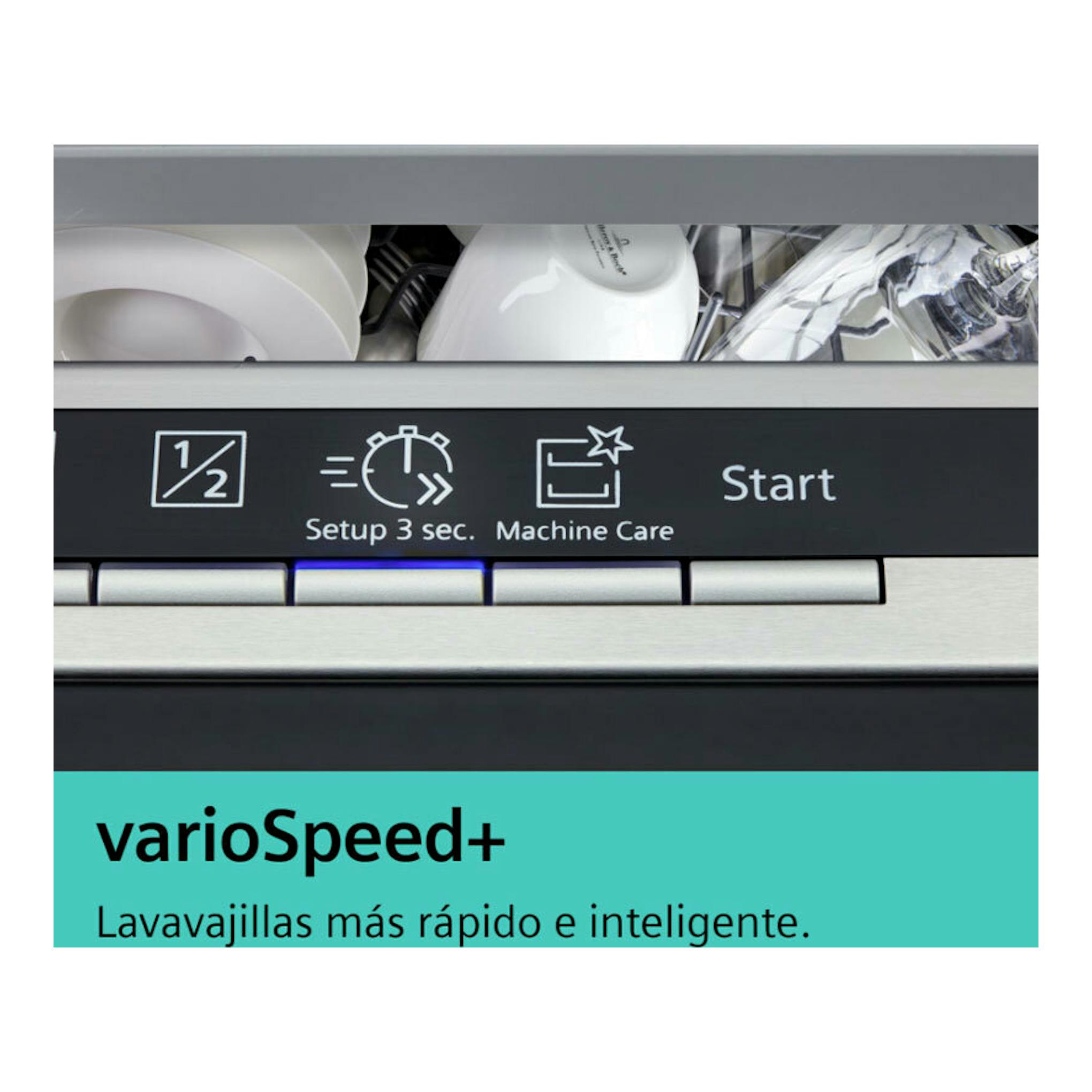 Lavavajillas integrable Siemens SN65ZX07CE, vista frontal parcial del panel negro con botones y vajilla dentro.