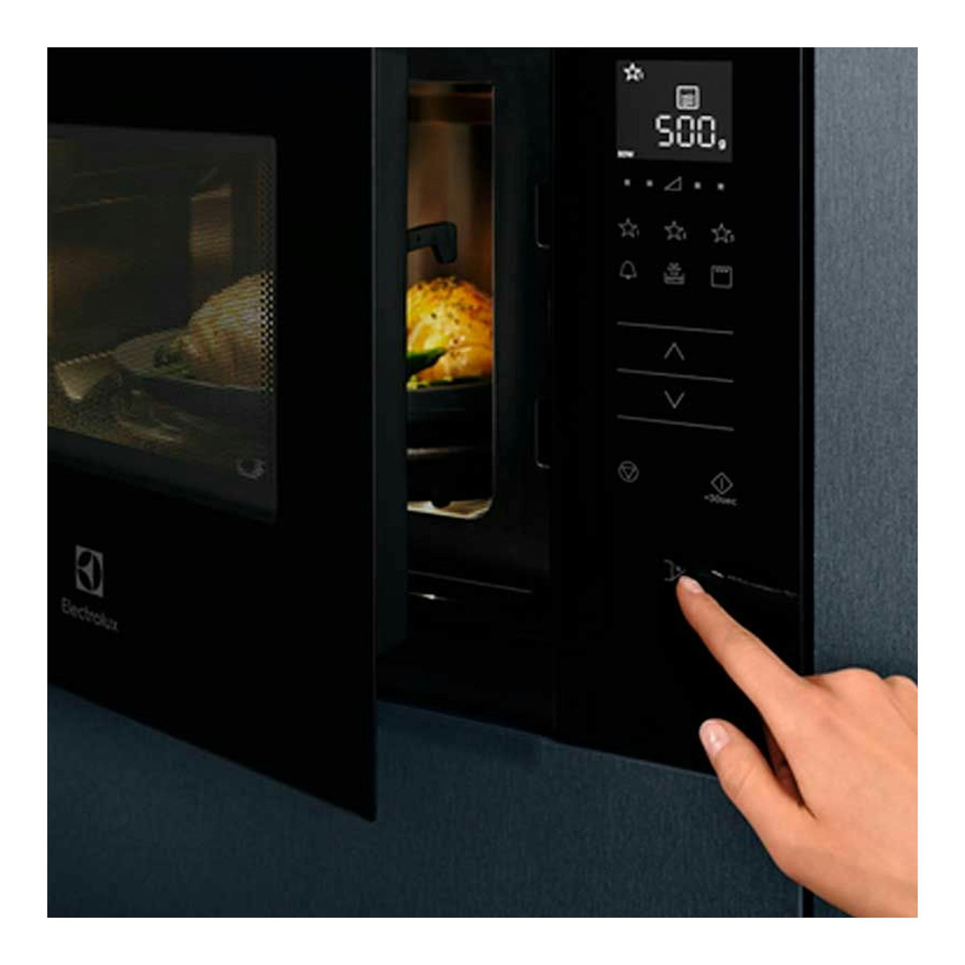 Microondas empotrable Electrolux KMFD264TEX negro, vista frontal parcial con puerta abierta y panel táctil.