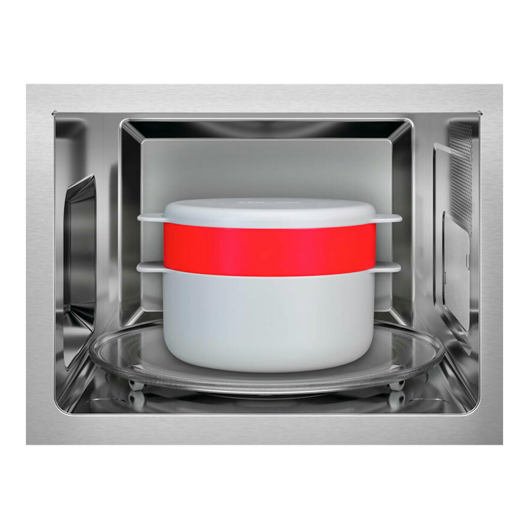 Microondas integrable AEG TB6GM171DB, vista frontal interior en acero inoxidable con recipiente blanco y rojo.