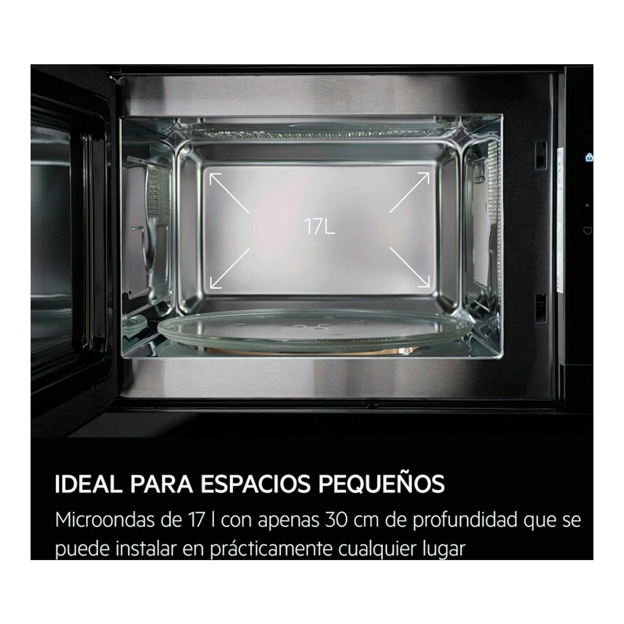 Microondas integrable AEG TB6GM171DB abierto, vista frontal del interior de acero inoxidable con plato giratorio.