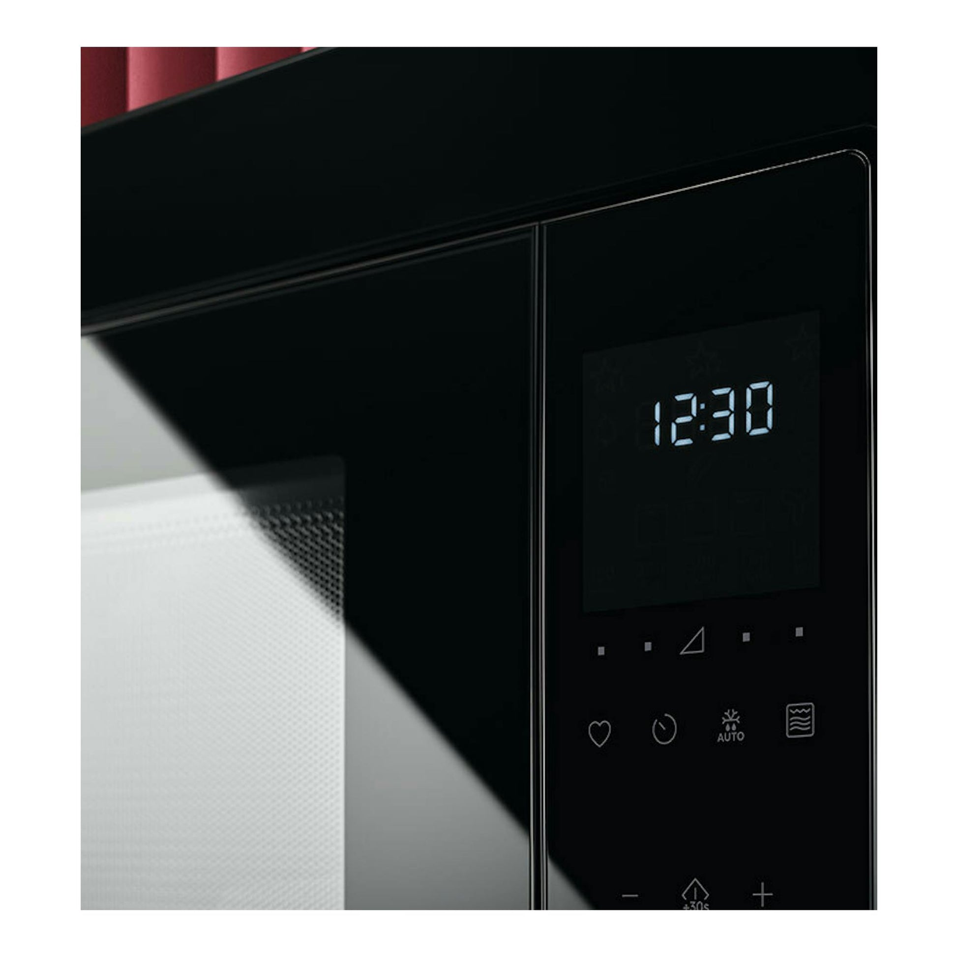 Microondas integrable AEG TS5GM25EB negro, vista frontal parcial con pantalla digital 12:30 y panel táctil.