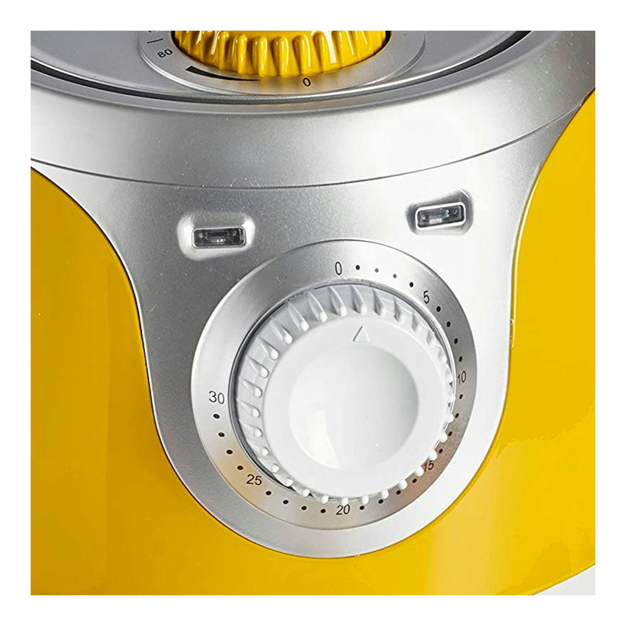 Mini freidora de aire Ariete 4615, primer plano frontal, cuerpo amarillo y panel plateado con dial de temporizador.