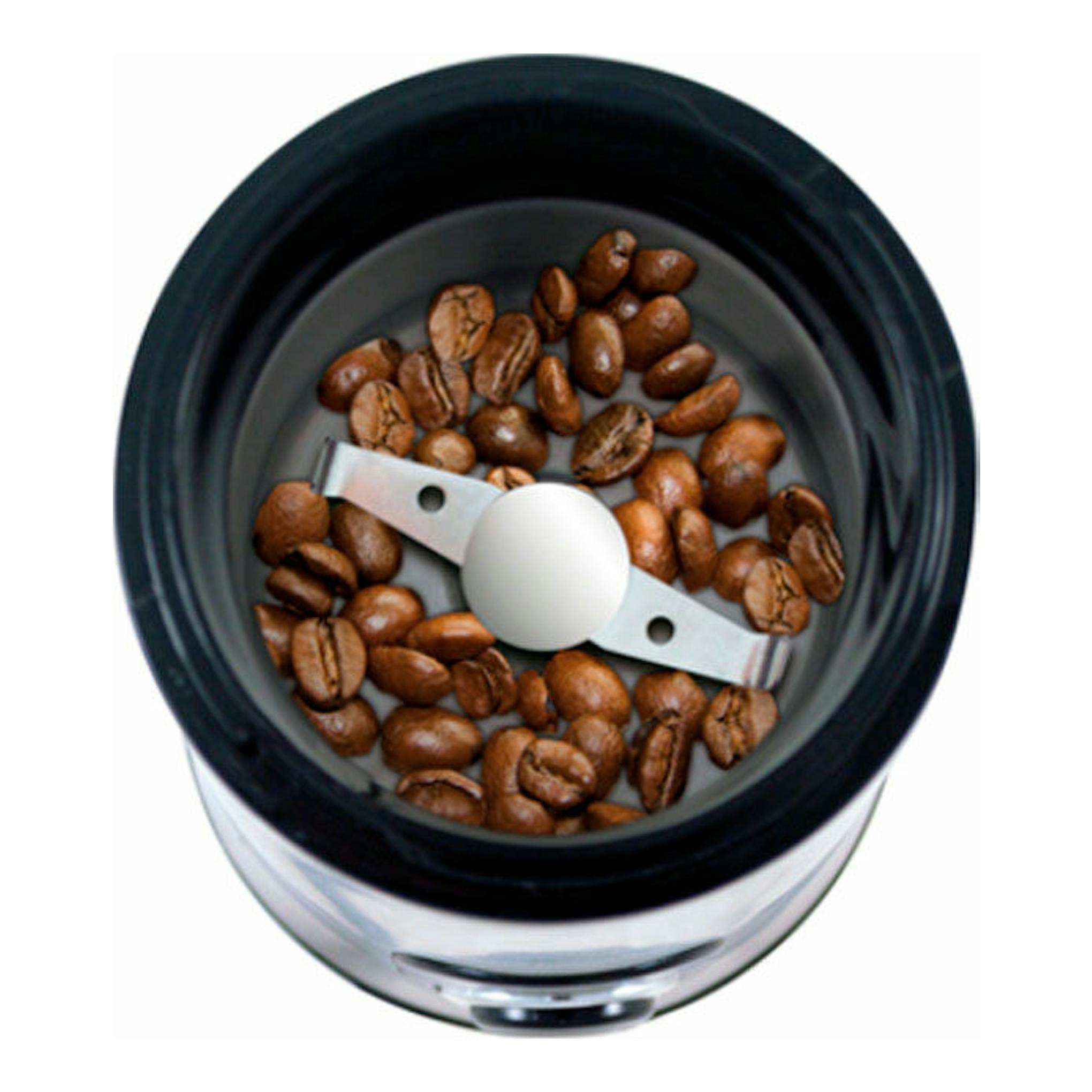 Vista superior de molinillo de café Taurus Aromatic negro con cuchillas y granos de café.