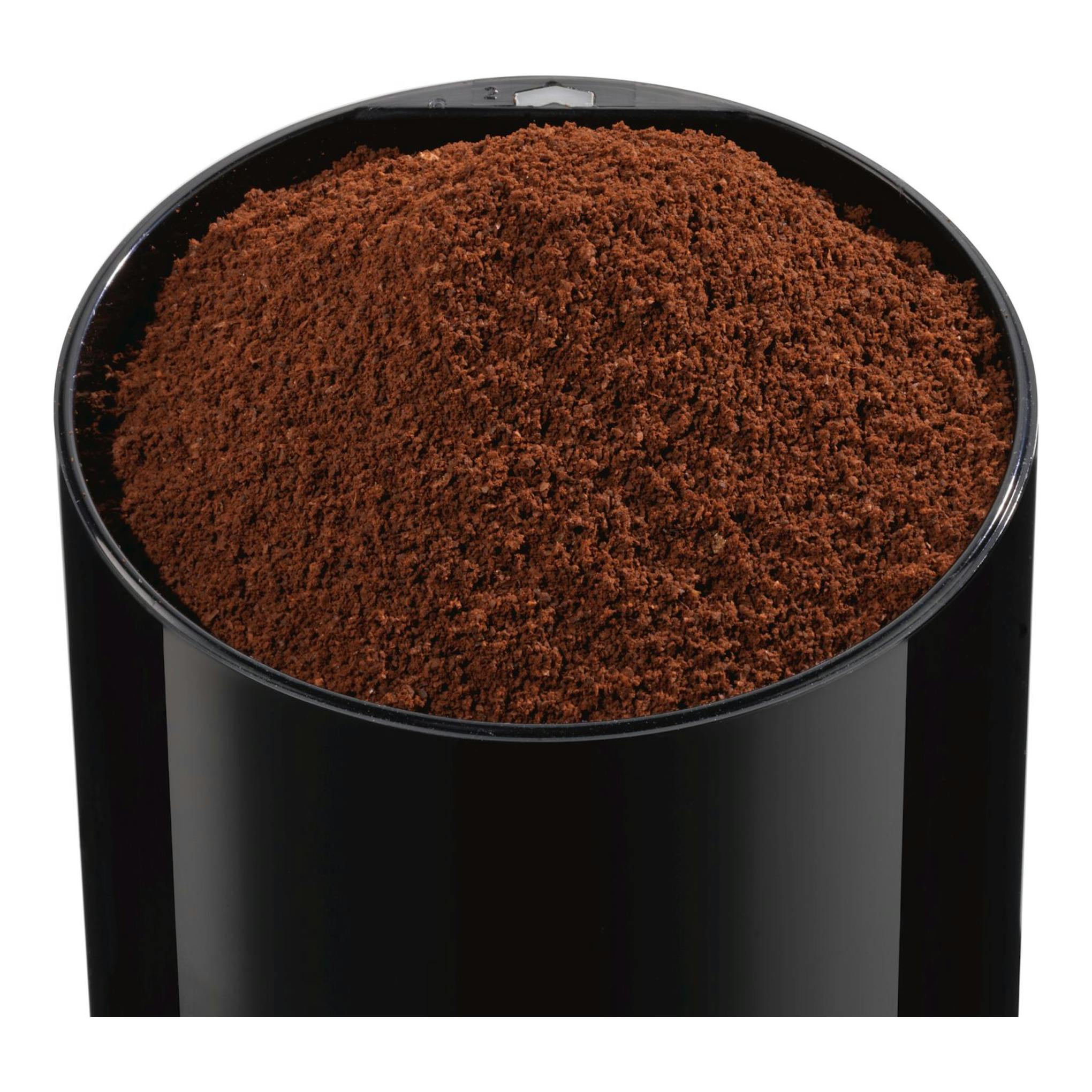 Bosch TSM6A013B, molinillo de café negro, vista superior, lleno de café molido.