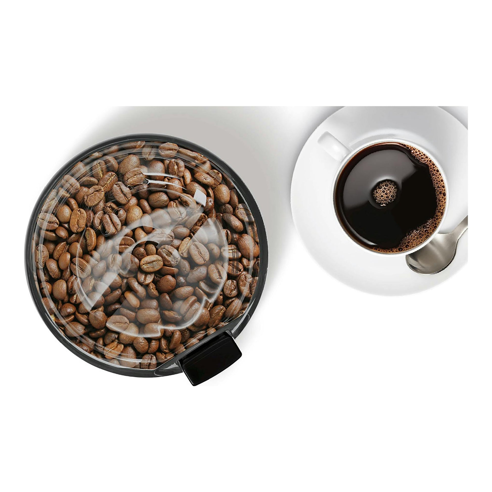 Bosch TSM6A013B, molinillo de café negro visto desde arriba, con granos visibles y una taza de café.
