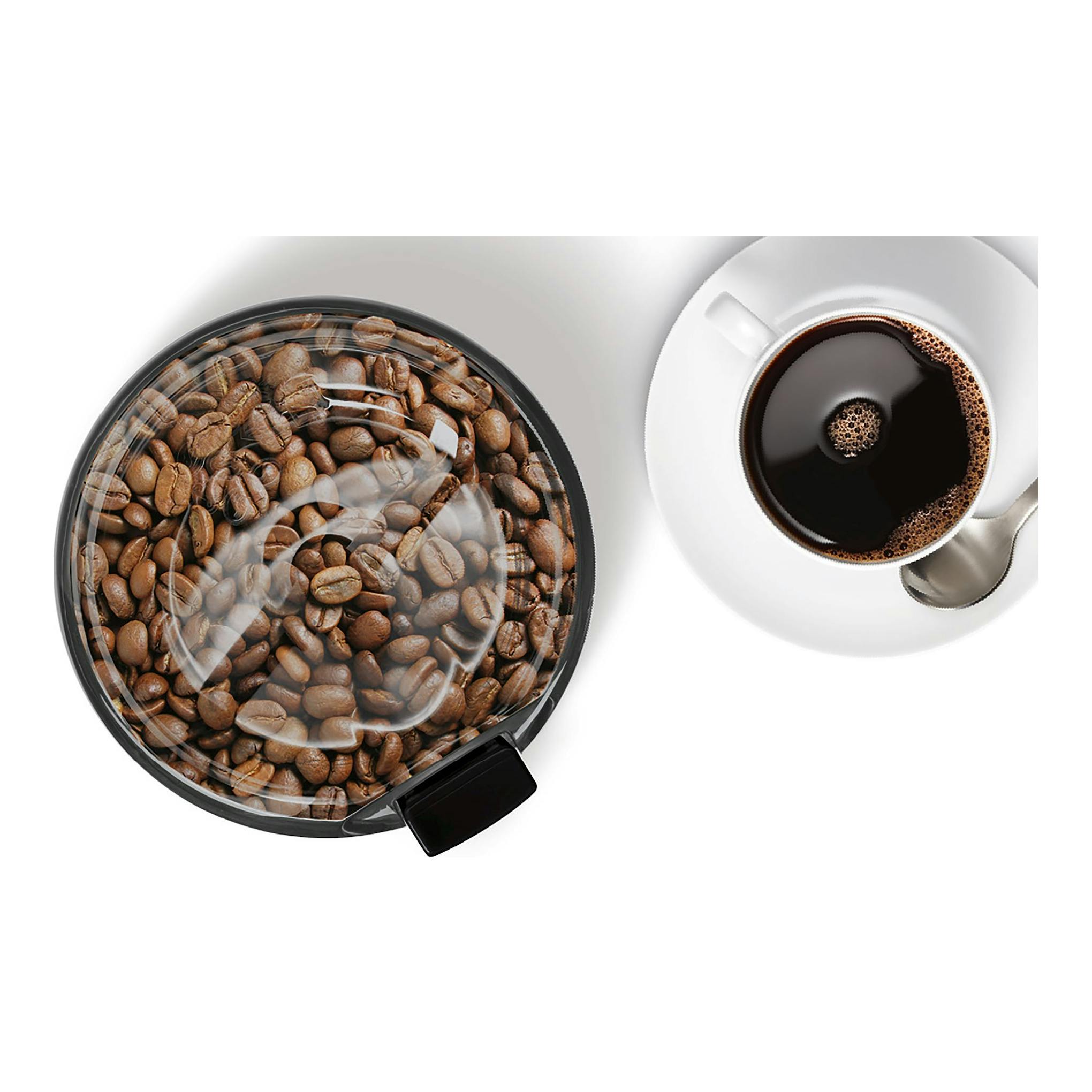 Bosch TSM6A013B, molinillo de café negro visto desde arriba, con granos visibles y una taza de café.