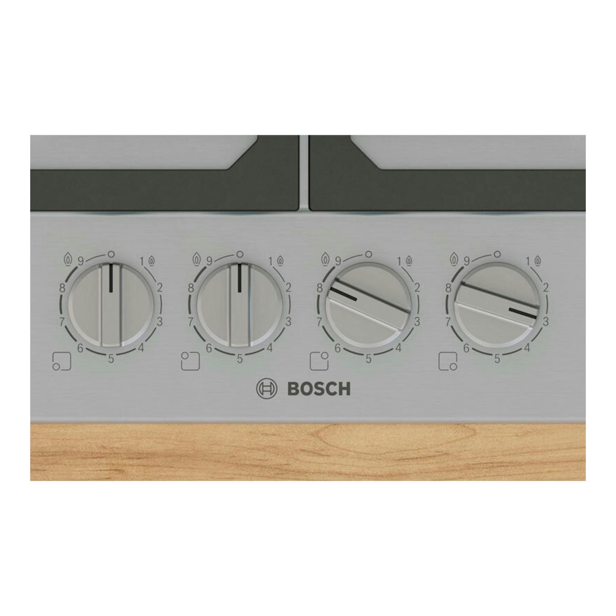 Primer plano frontal de placa de acero inoxidable Bosch con cuatro mandos giratorios negros y grises.
