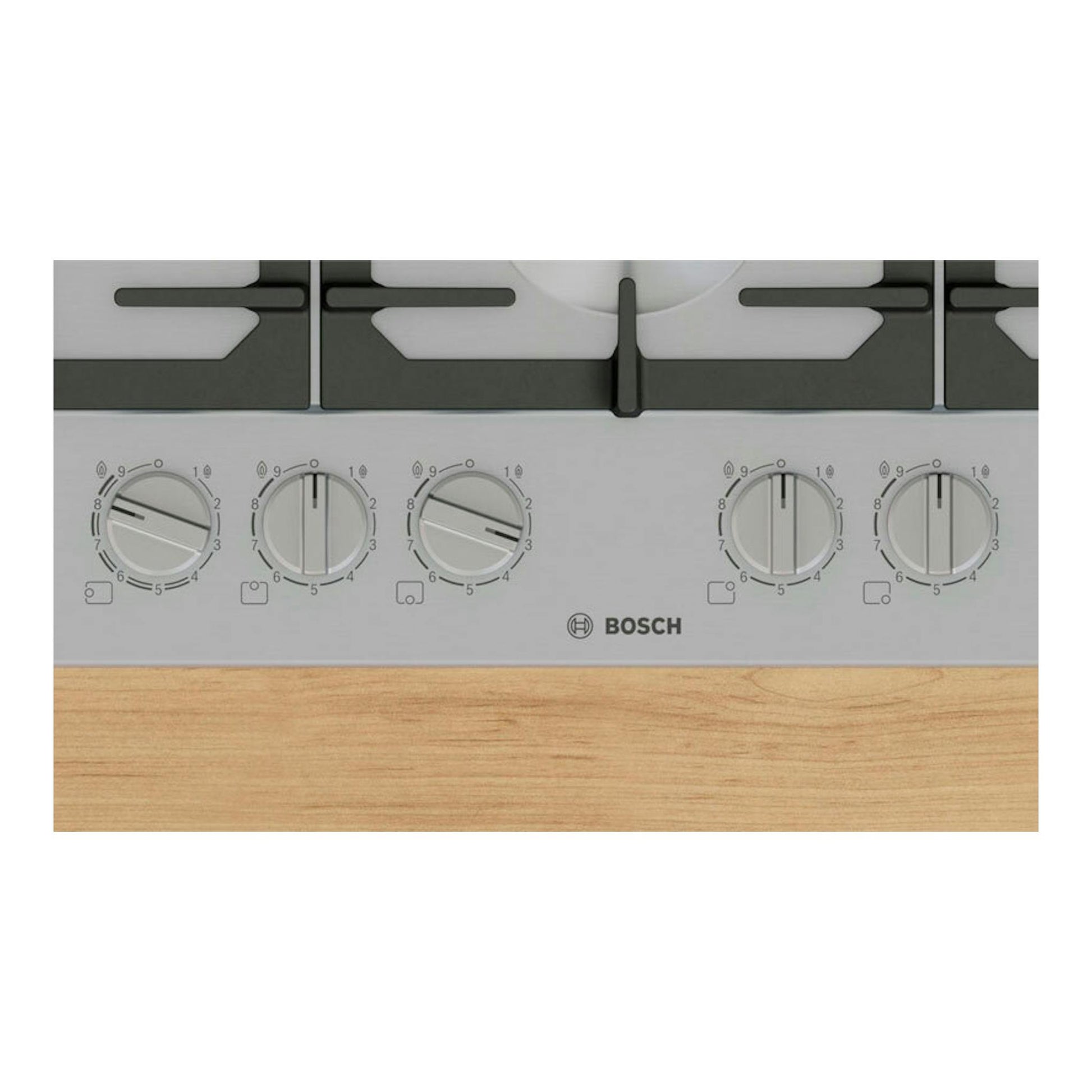 Placa de gas Bosch PCS7A5I90, vista frontal en acero, con cinco mandos y quemadores negros sobre encimera de madera.