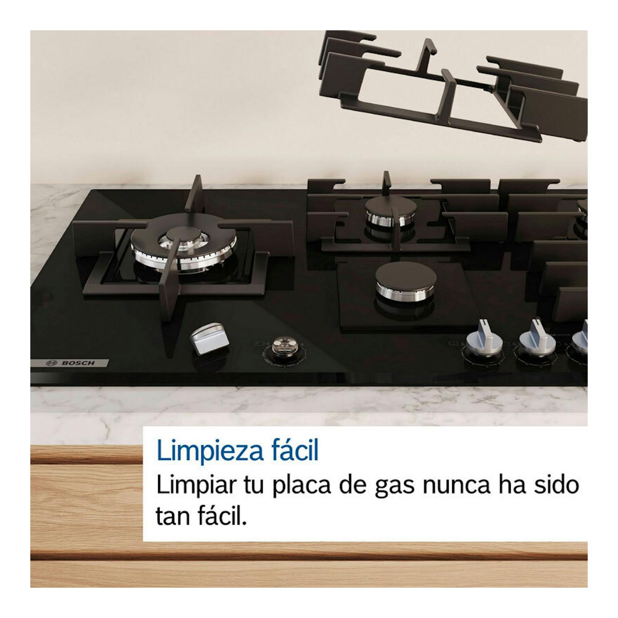 Placa de gas Bosch PPC6A6I10 negra de cristal, vista frontal con quemadores y mandos.