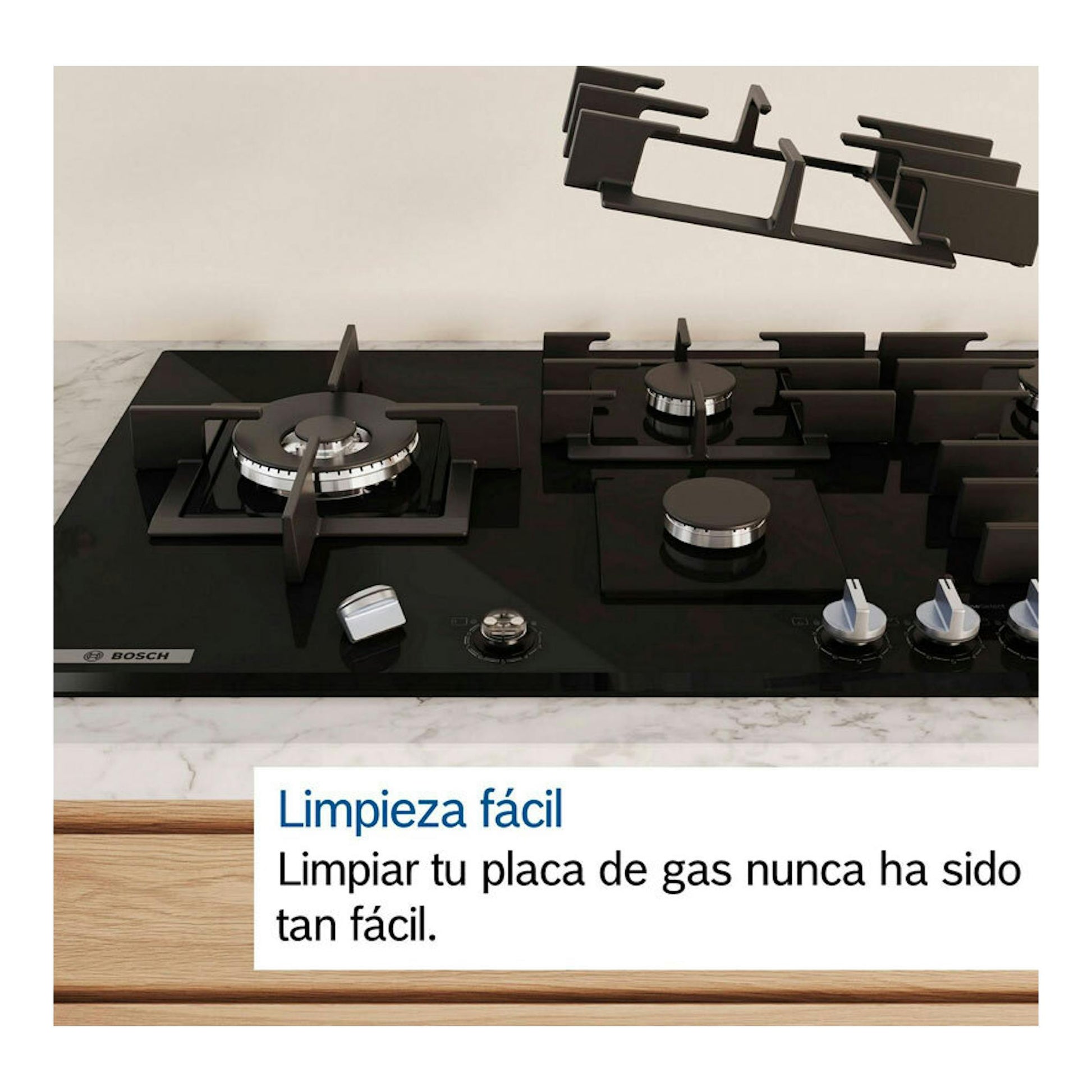 Placa de gas Bosch PPP6A6I10 de cristal negro, vista frontal con cinco quemadores.