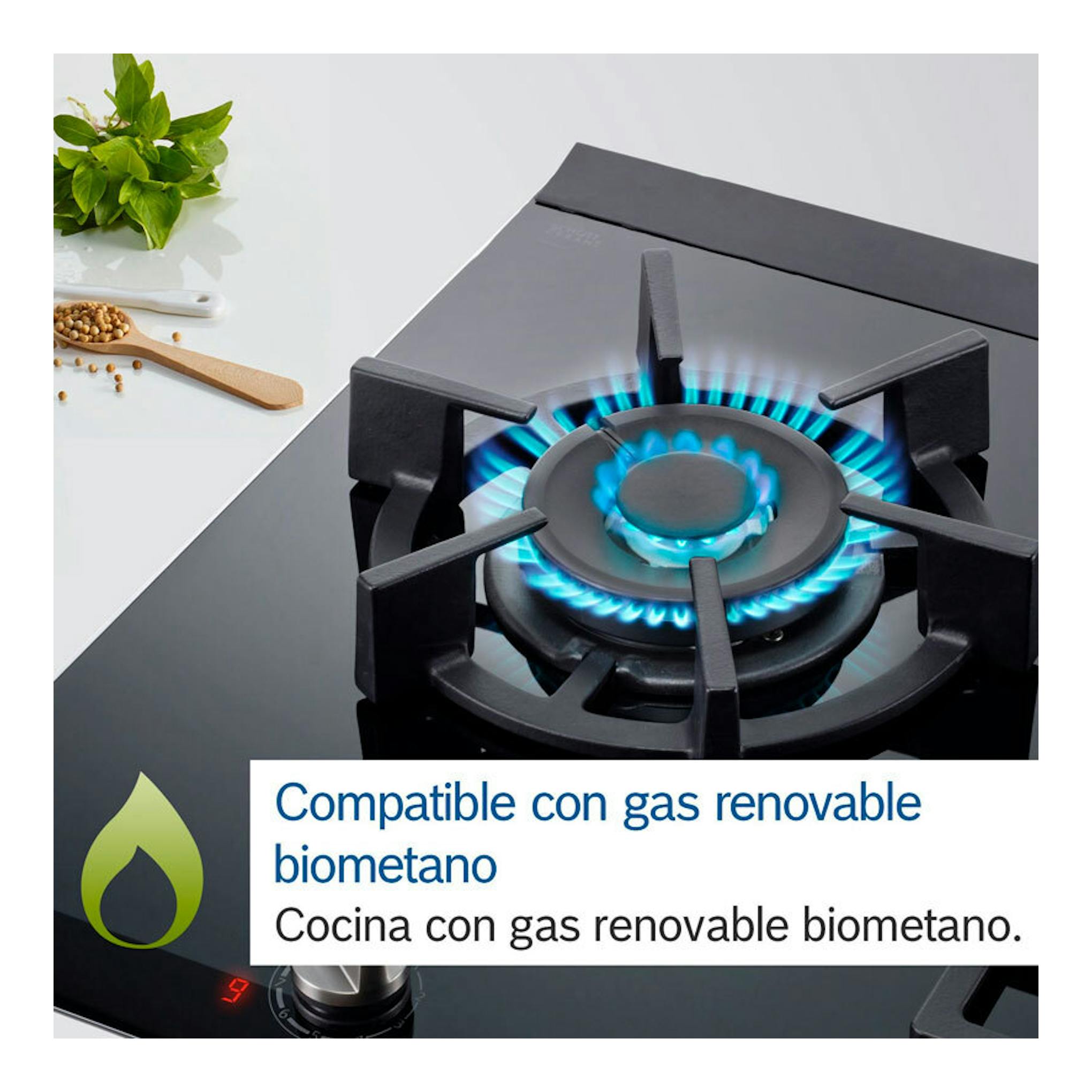 Placa de gas Bosch PRA3A6I10 en cristal negro, con un quemador encendido y llama azul, vista en ángulo.