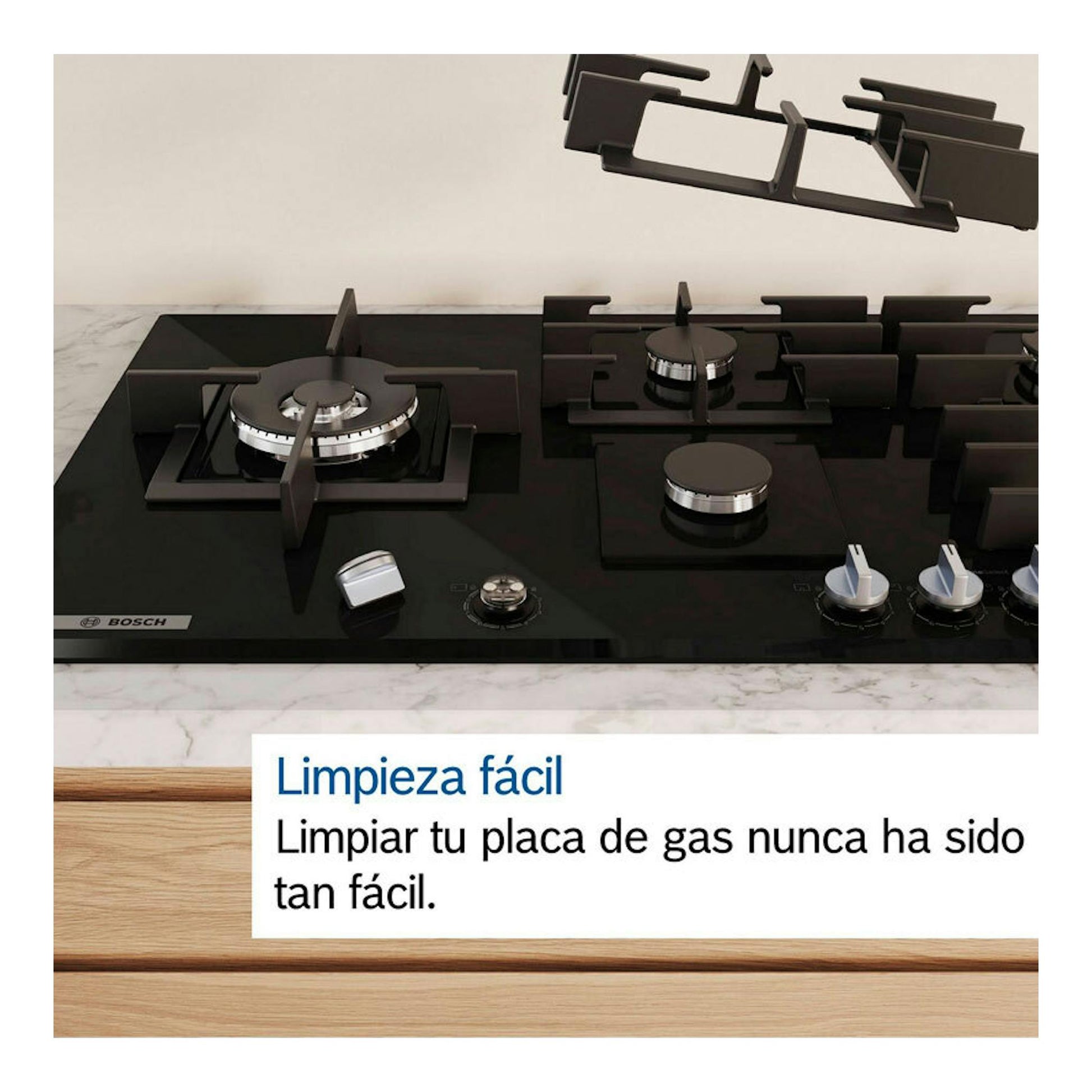 Placa de gas Bosch PRA3A6I10 de cristal negro, vista frontal con tres quemadores y mandos.