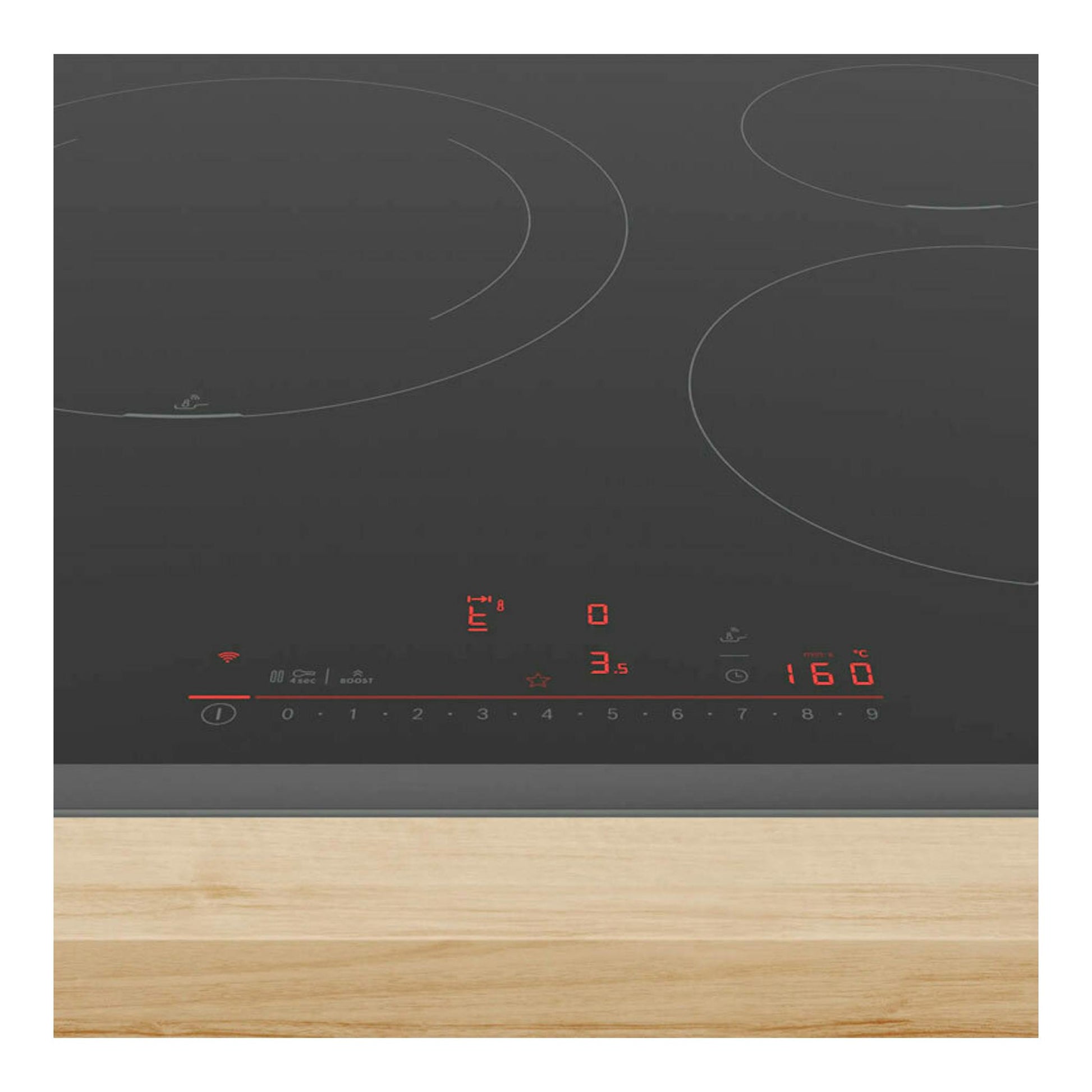 Placa de inducción Bosch PIJ631HC1E negra, vista superior, con mandos táctiles rojos sobre encimera de madera.
