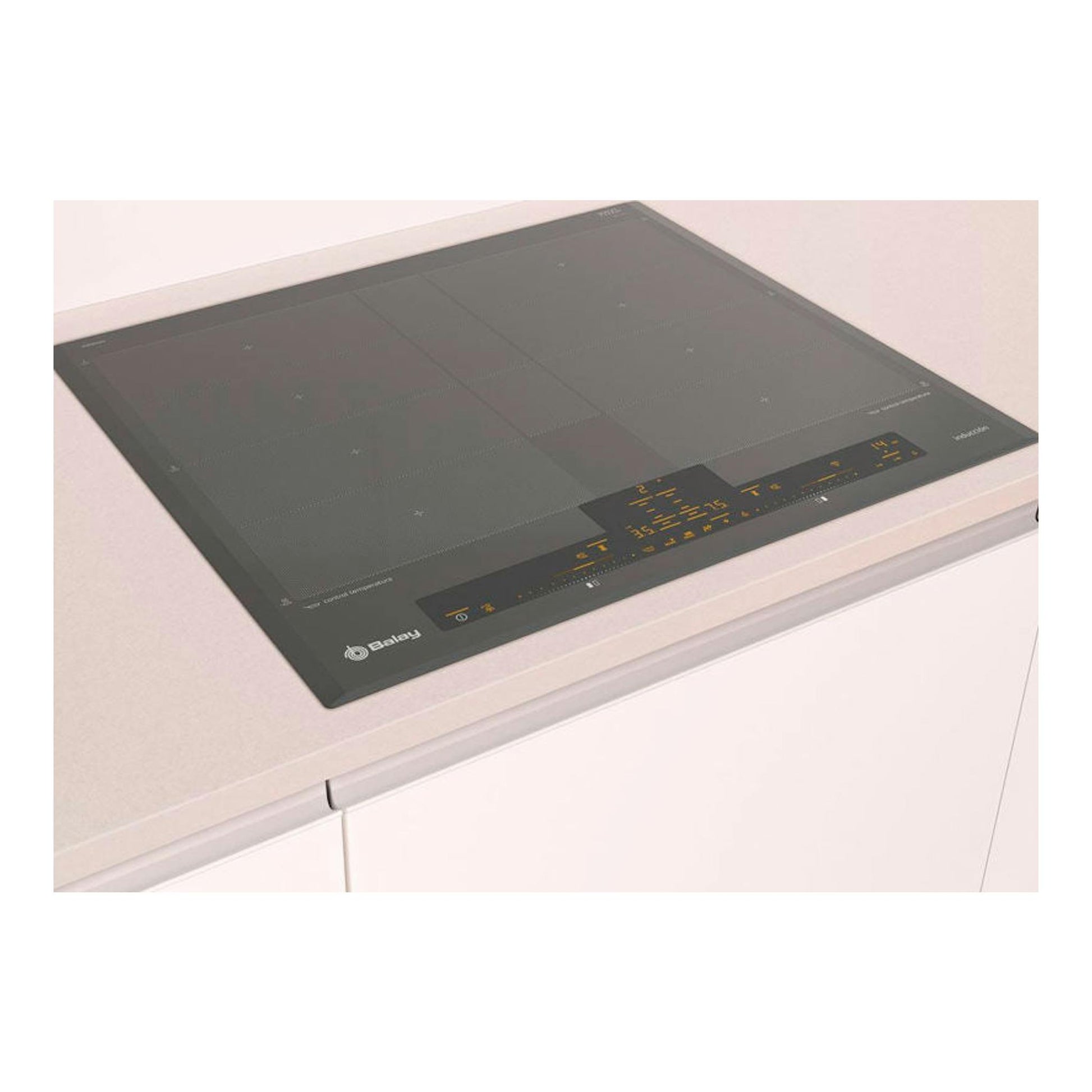 Placa de inducción Balay negra de 60 cm, vista en ángulo sobre encimera blanca.