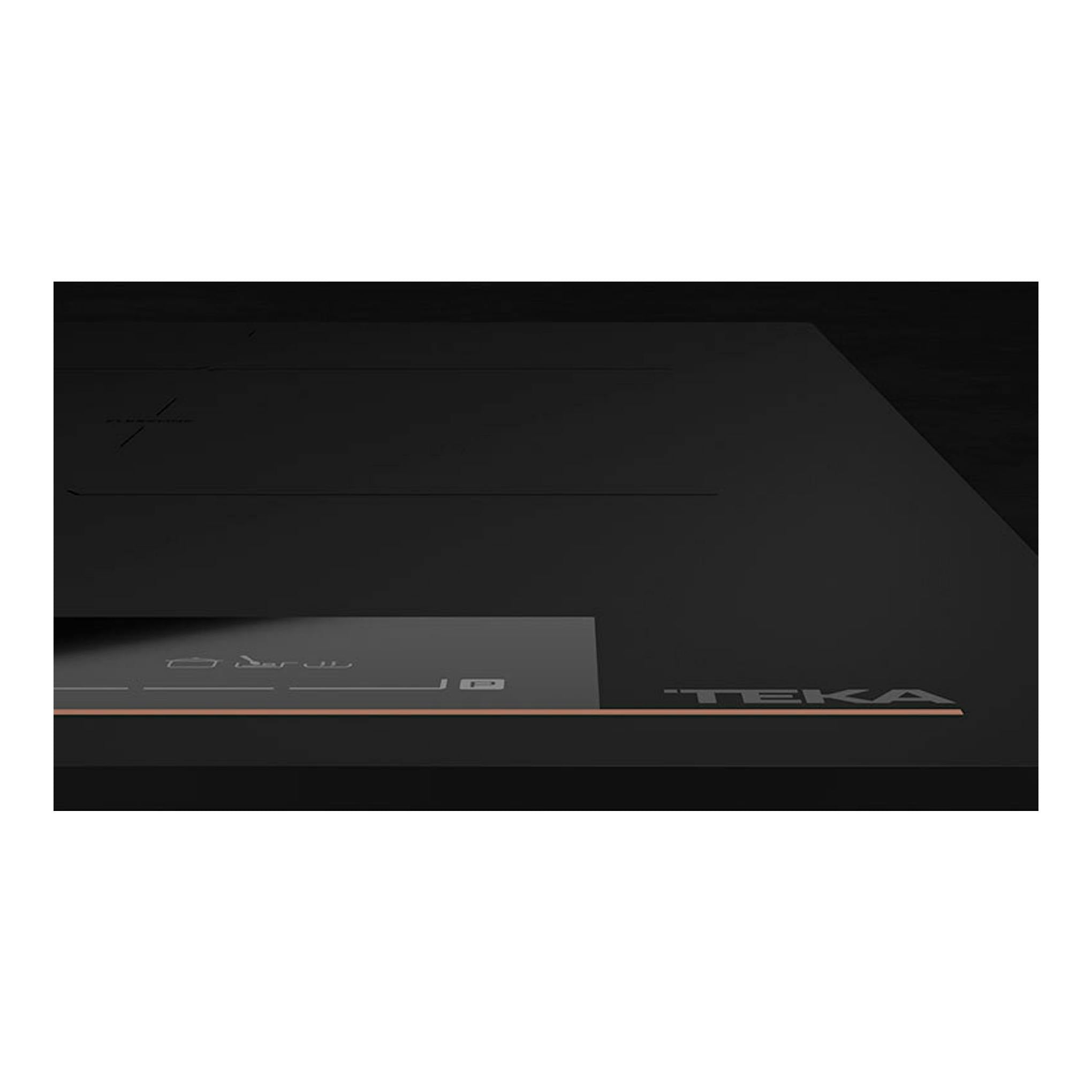 Placa de inducción Teka IBF64G1MSP BM negra, vista en ángulo, con control táctil frontal.