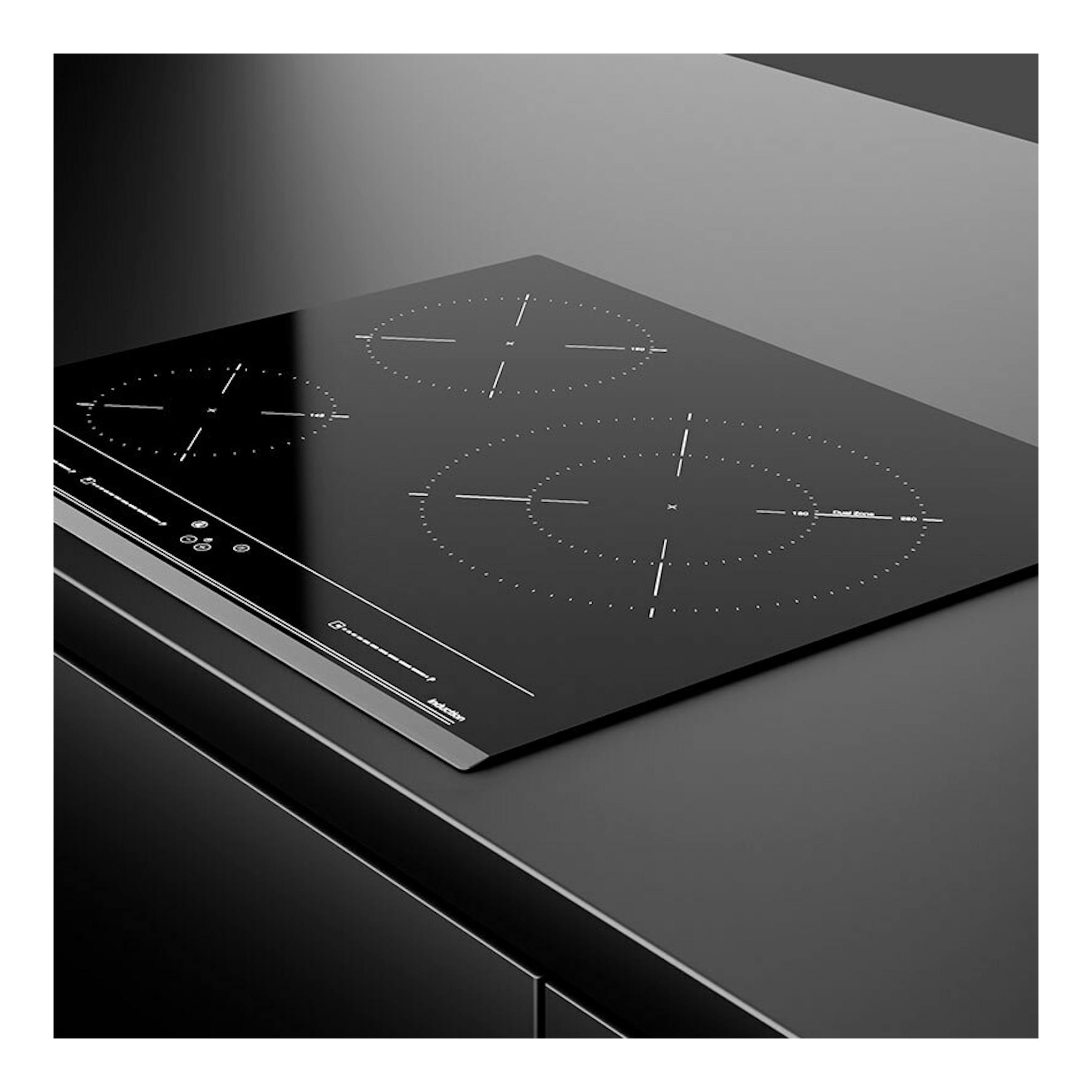 Placa de inducción Teka IZC 63015 MSS negra, vista en ángulo con cuatro zonas de cocción.