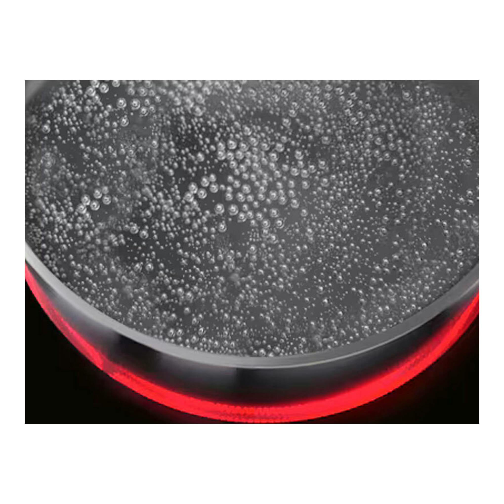 AEG HRB63321CK: primer plano de una zona circular de placa vitrocerámica negra con aro rojo iluminado.