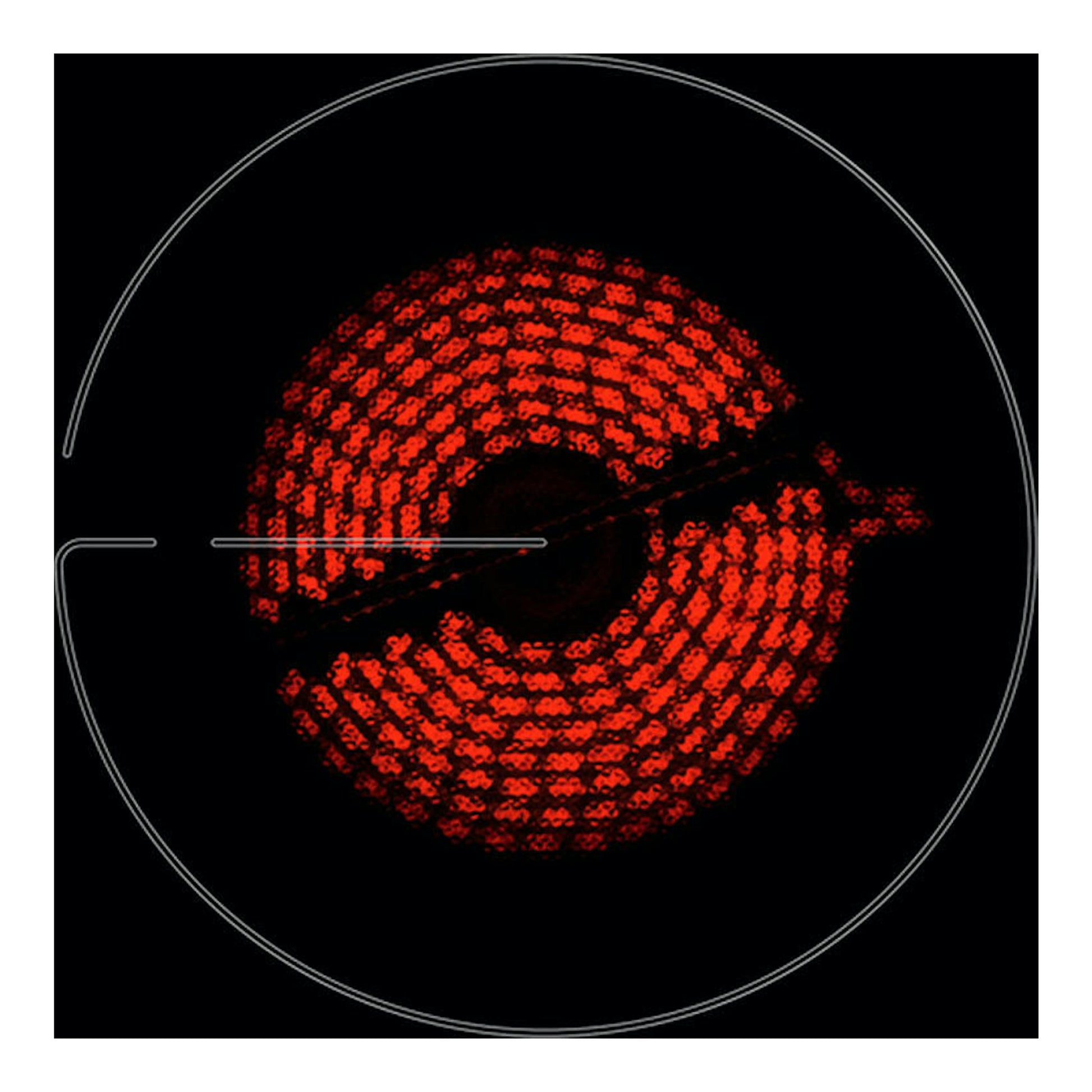Placa vitrocerámica Zanussi ZHRN639K negra, vista superior, con zona de cocción circular roja.