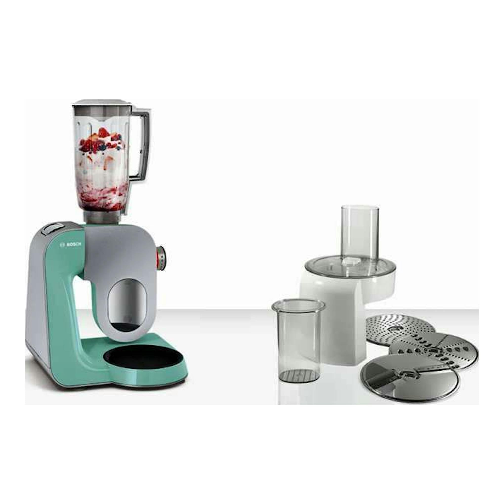 Robot de repostería Bosch MUM58020, vista frontal, en gris y turquesa, con vaso batidor y discos accesorios.