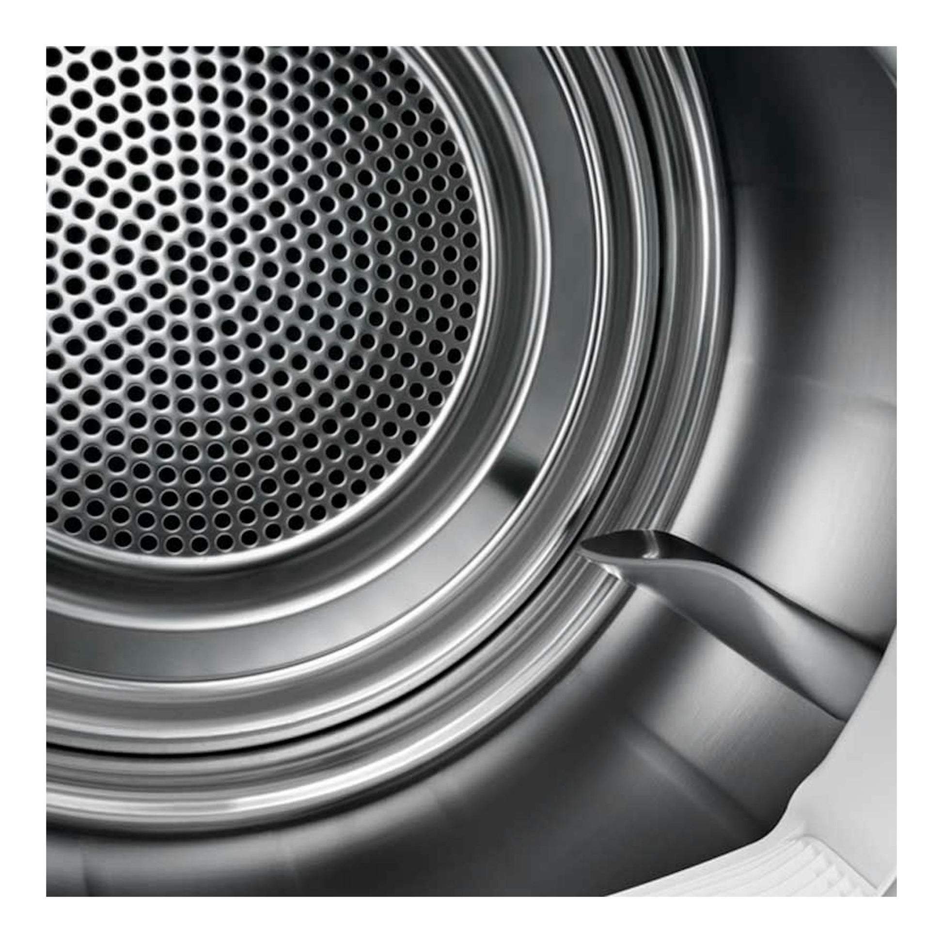 Secadora Electrolux EW7H5825IB, vista interior del tambor metálico en primer plano.