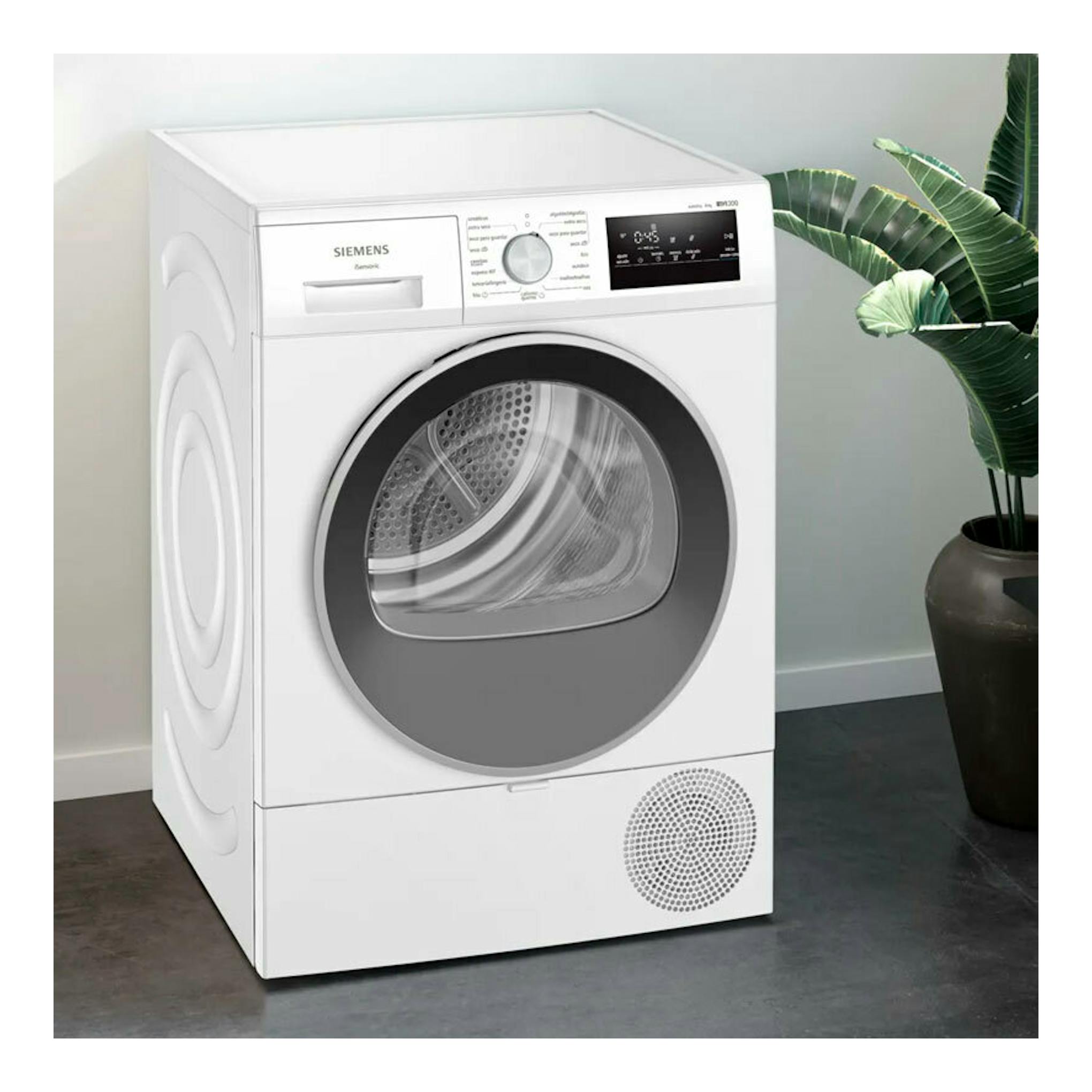 Secadora Siemens WT45HV00ES blanca, vista frontal en ángulo, con puerta circular y panel digital.